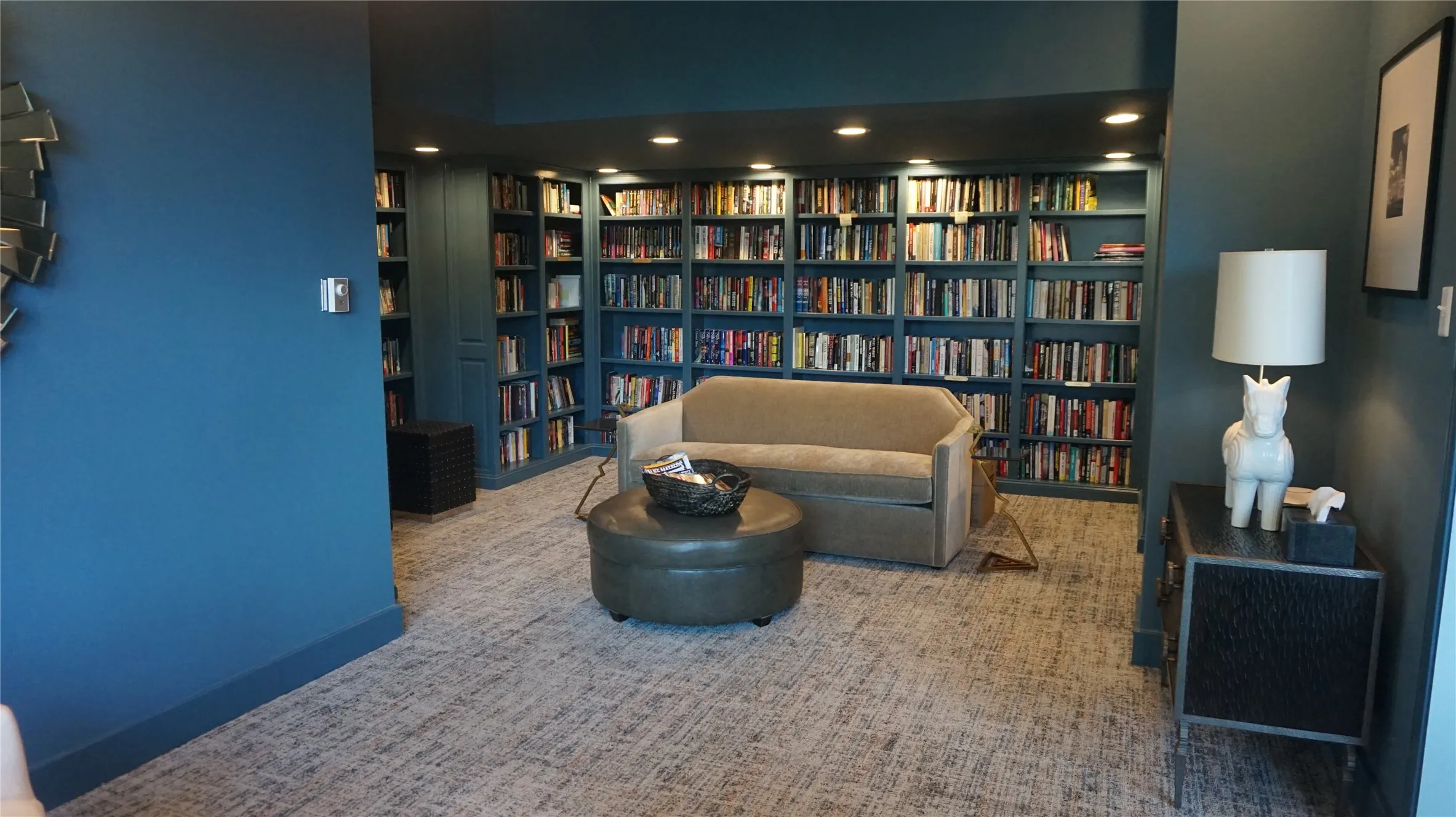 Built-in bookshelves with recessed lighting