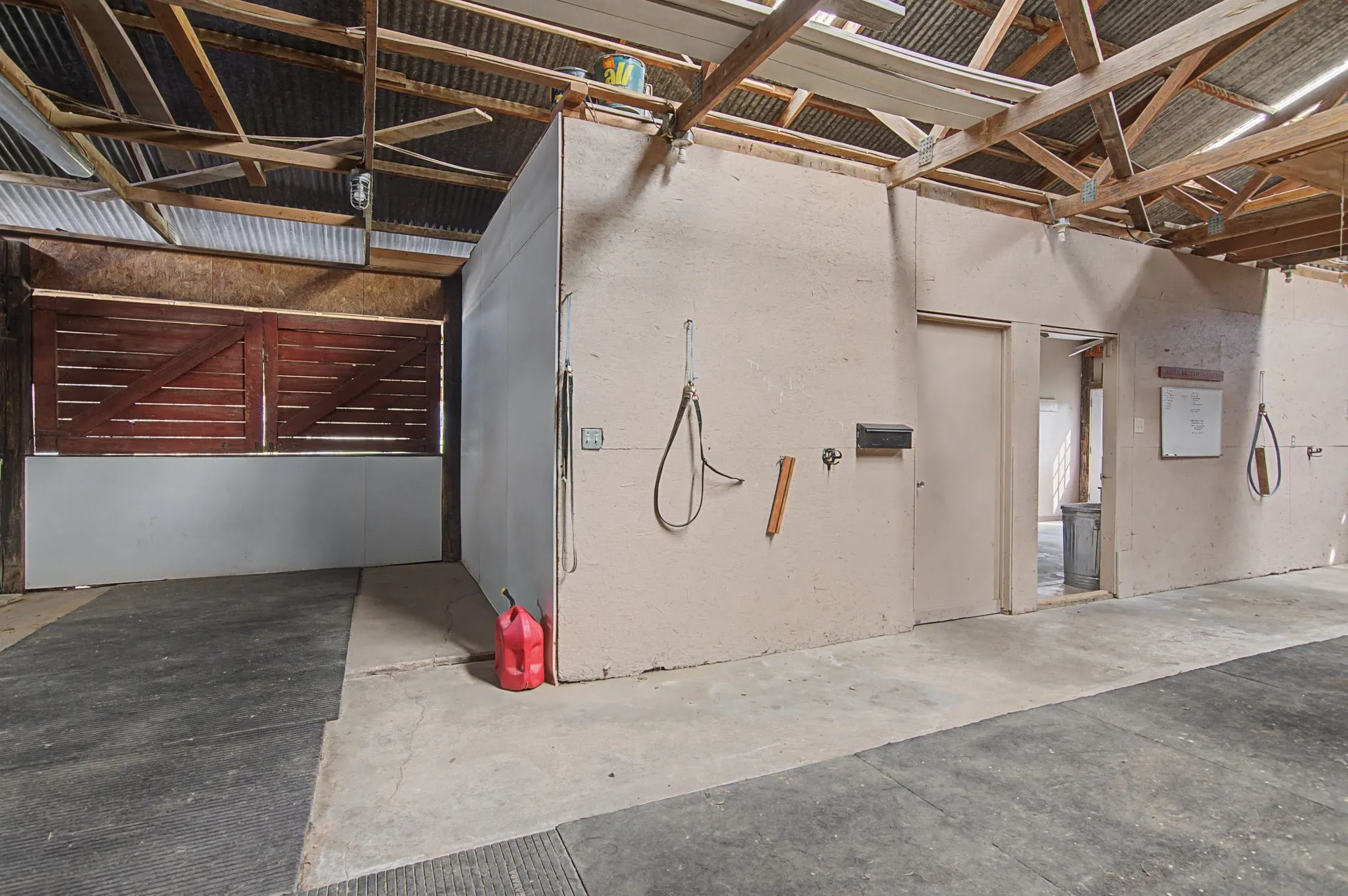Concrete flooring with partial rubber matting