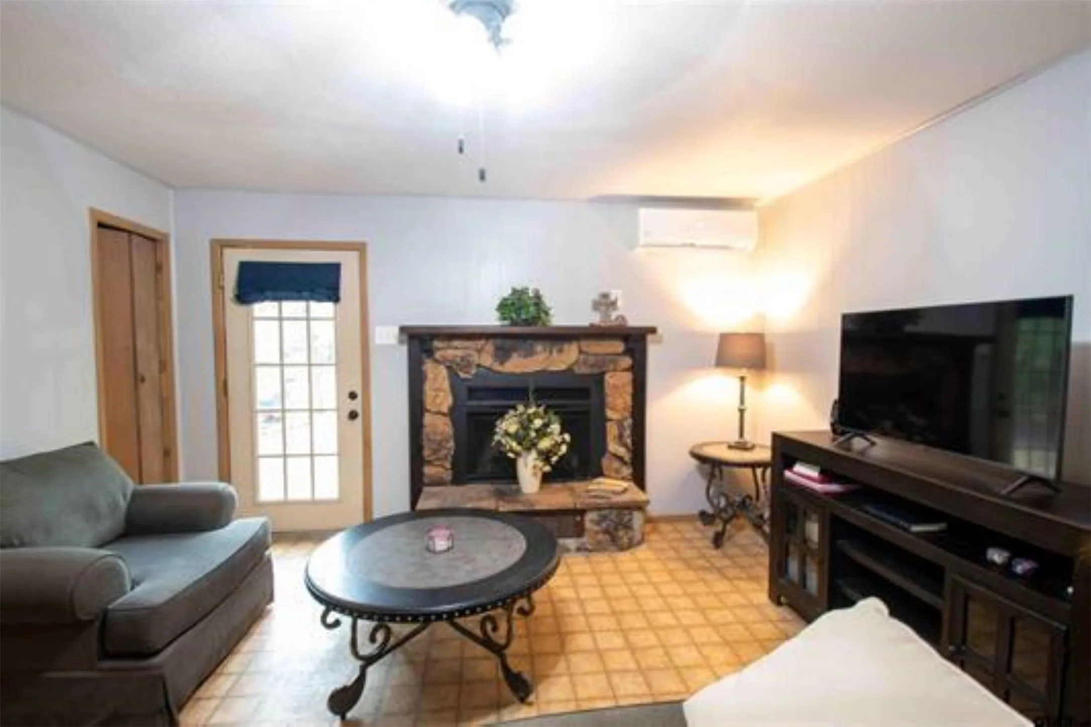 Living room with wood burning stove.