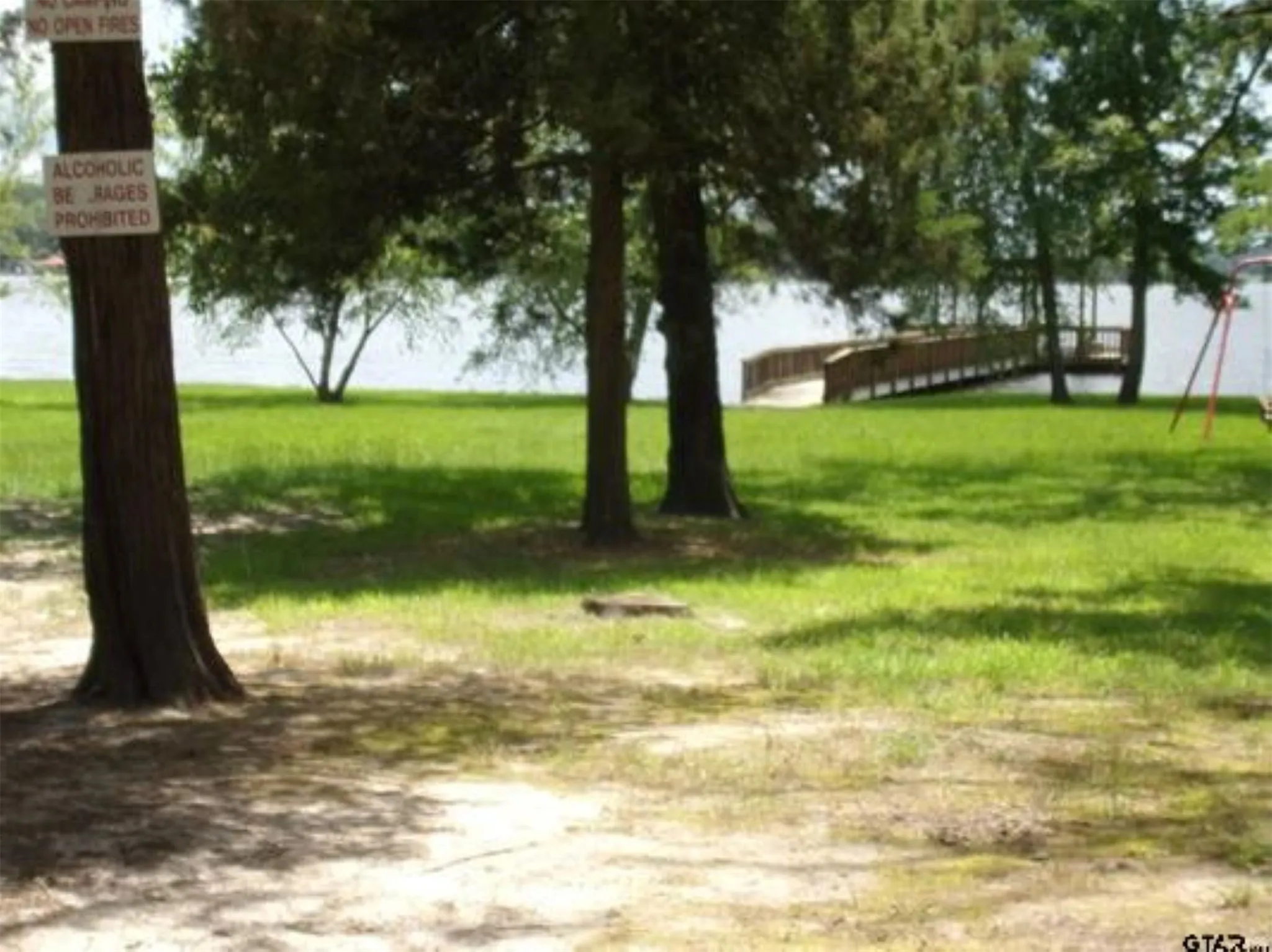 Park area walking up to fishing pier.