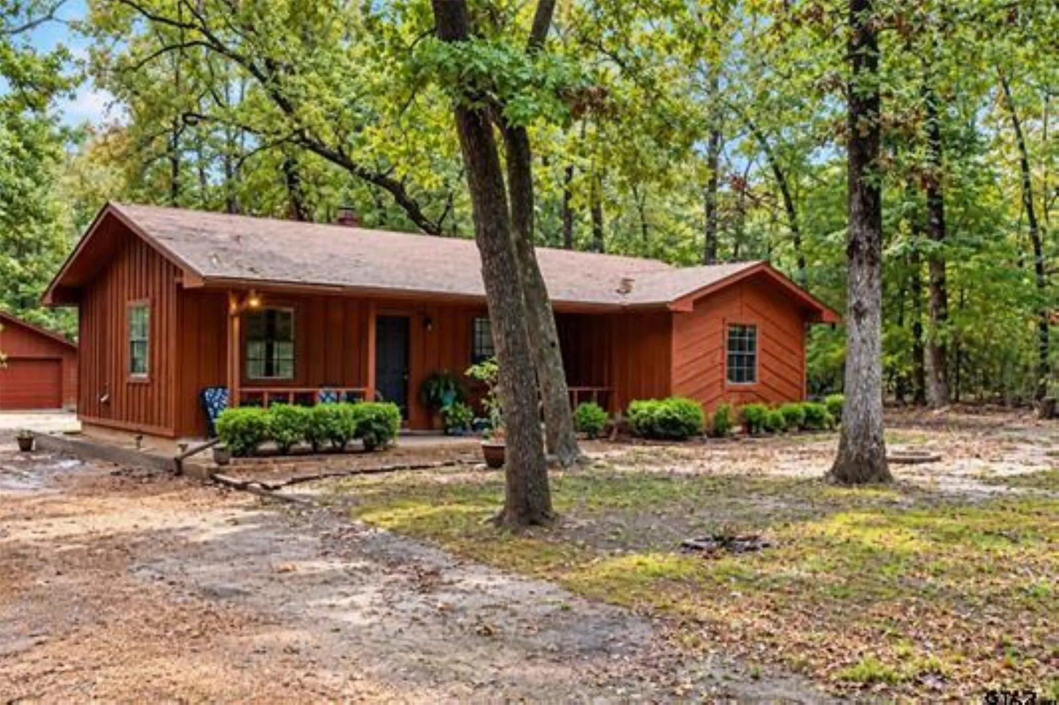 Beautiful cedar home with large covered porch.