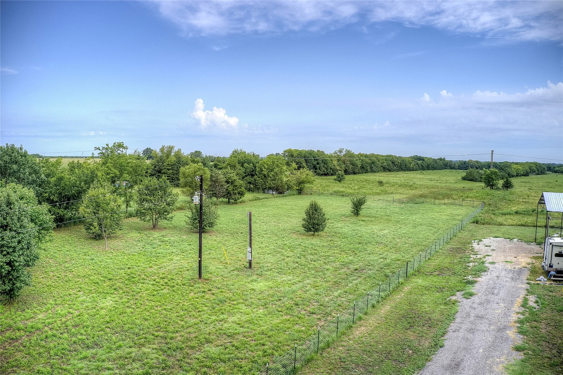 View of yard featuring a view of rural / pastoral area