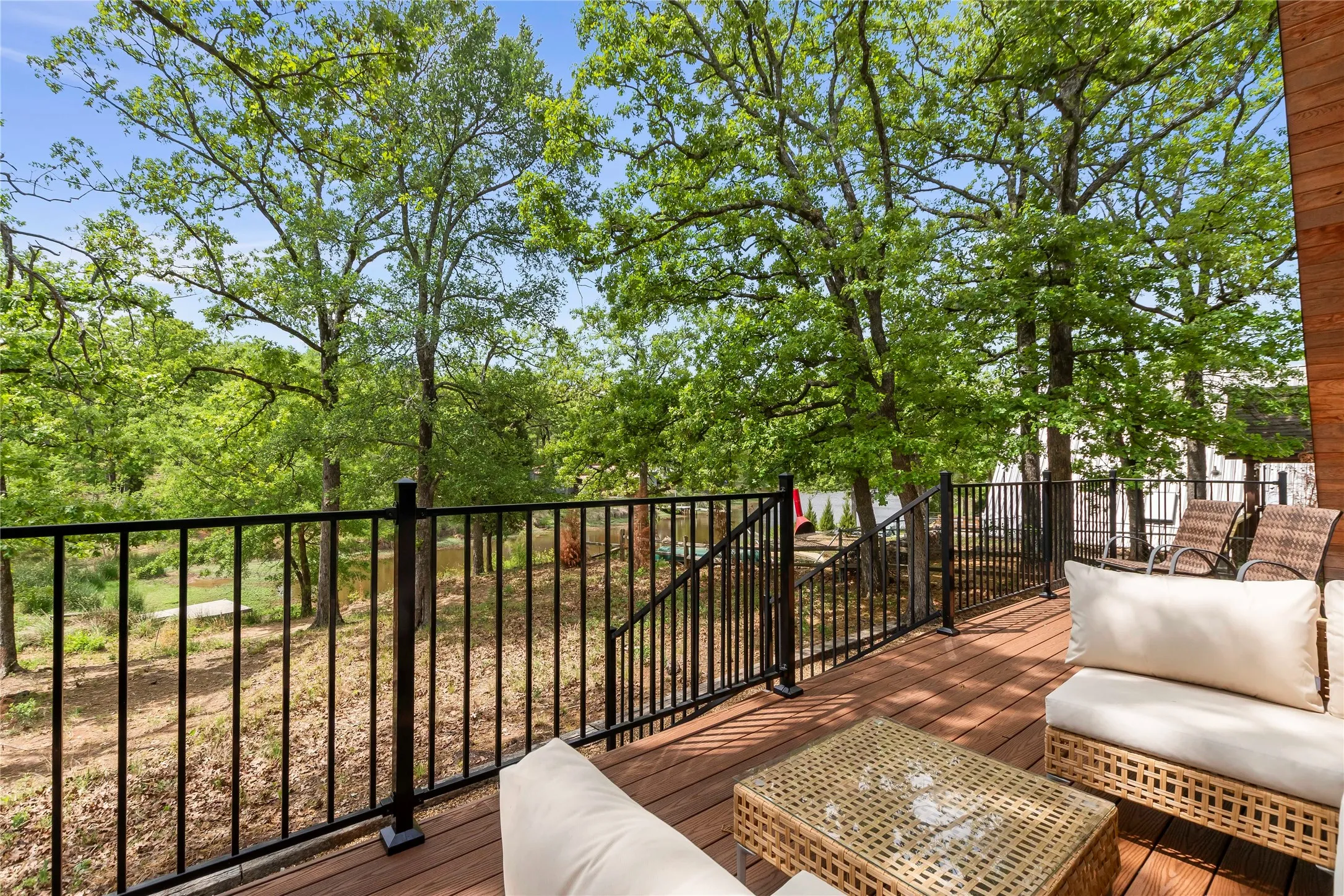 Back patio with access to pond