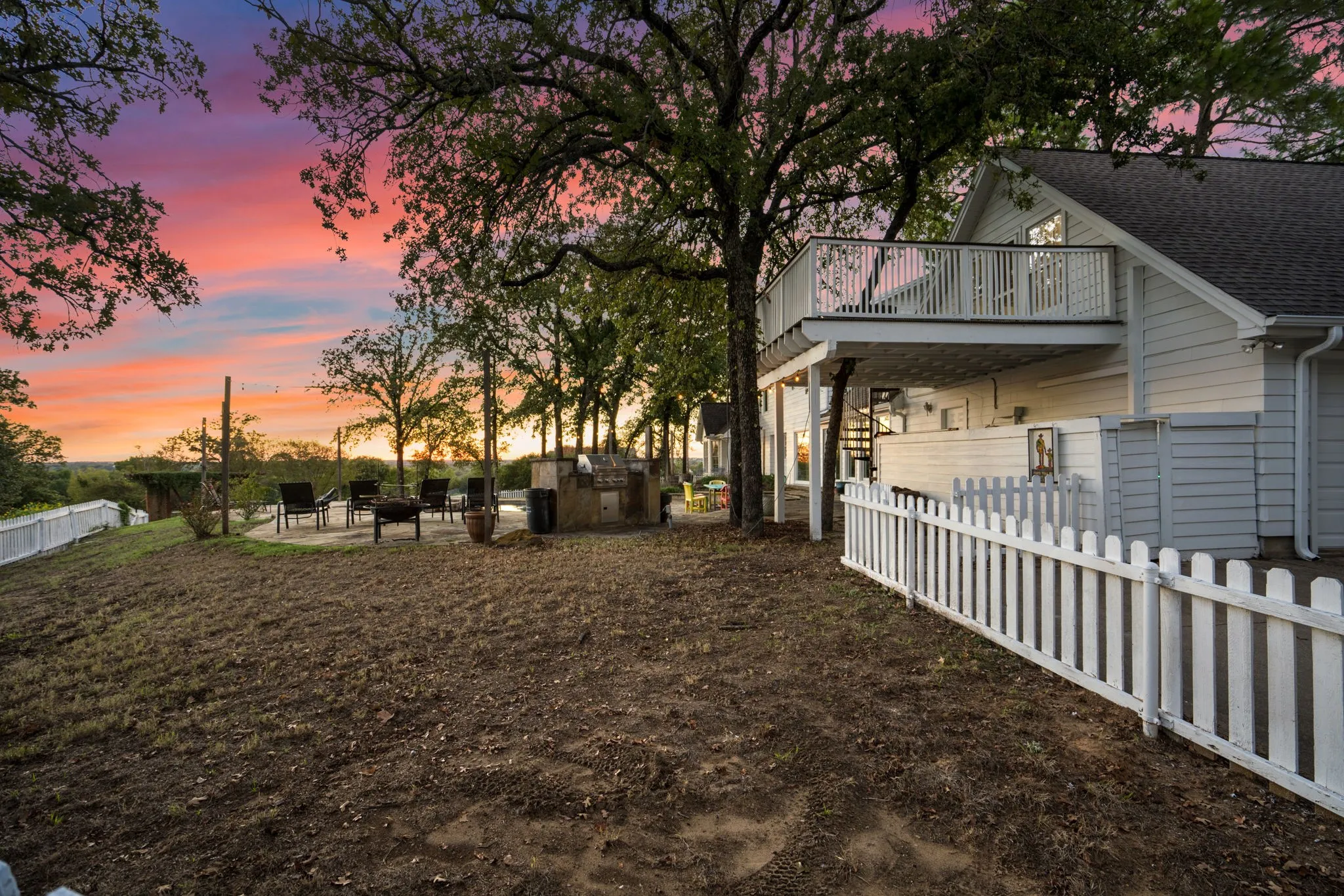 White picket fence bordering the property