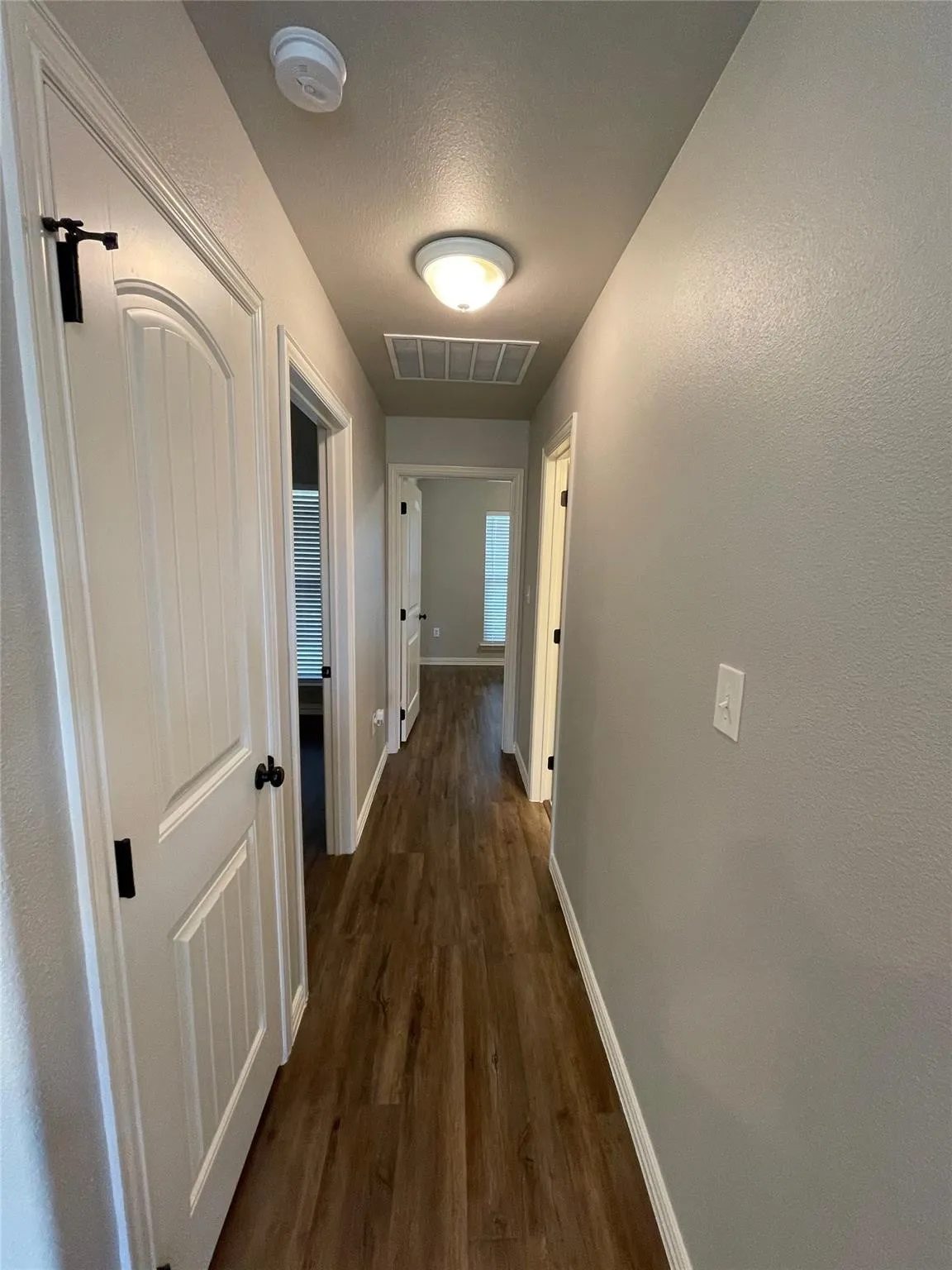 Hallway to secondary bedrooms