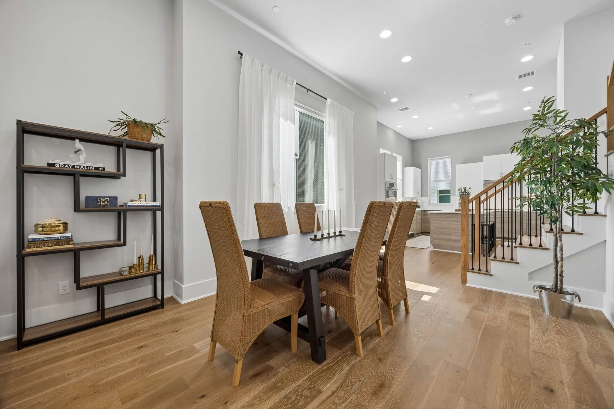 Generous space between the living room and kitchen allows for a larger dinner parties if desired.