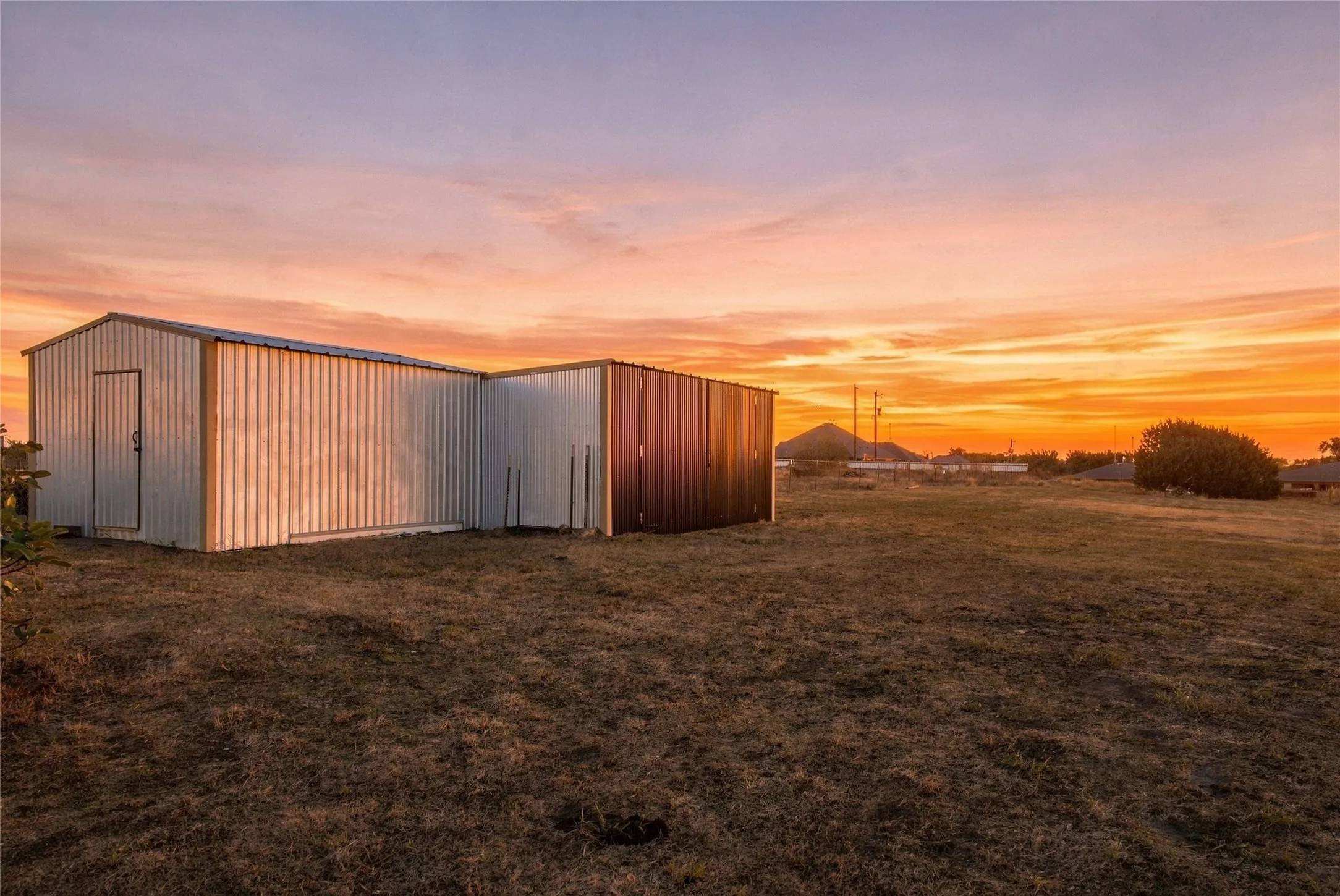 20 x 20 Shop Metal-sided outbuilding with multiple sections and a sloped roof