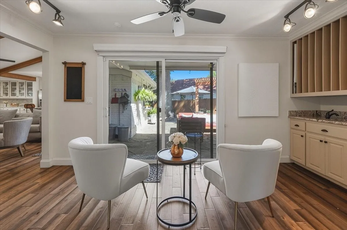 Library with wet bar, reading area or painting room.