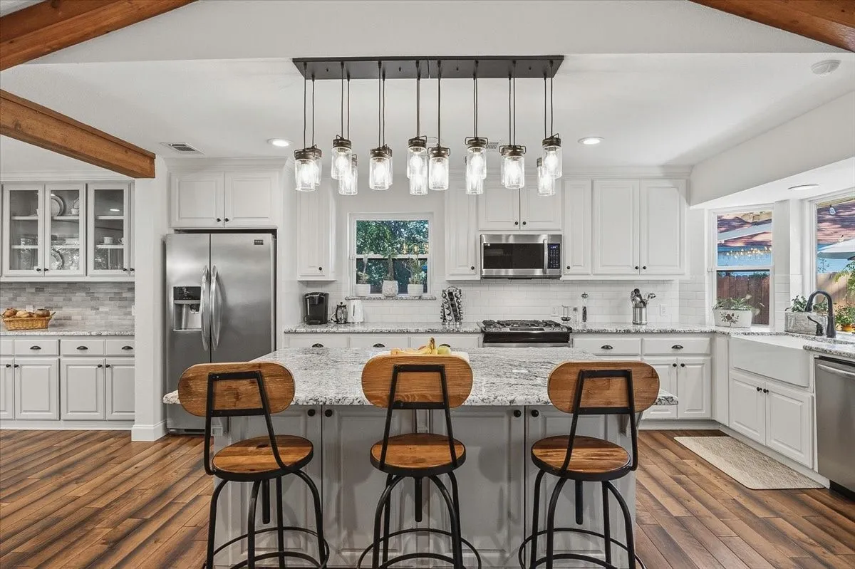 Gourmet kitchen is where everyone will want to hangout.