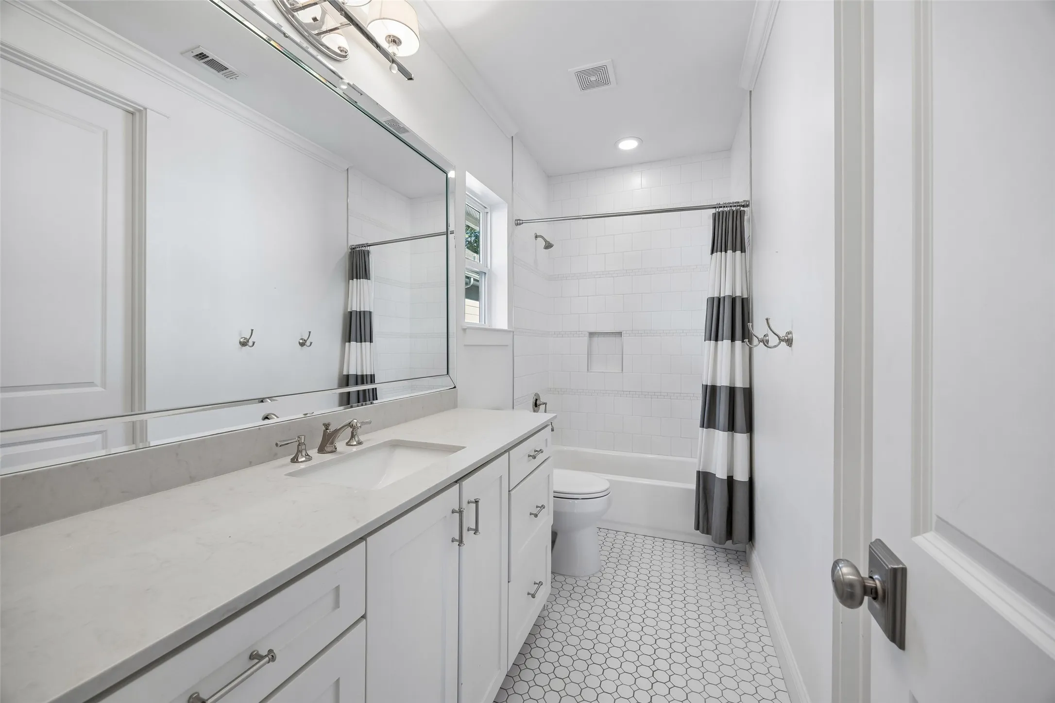 Secondary attached bathroom.