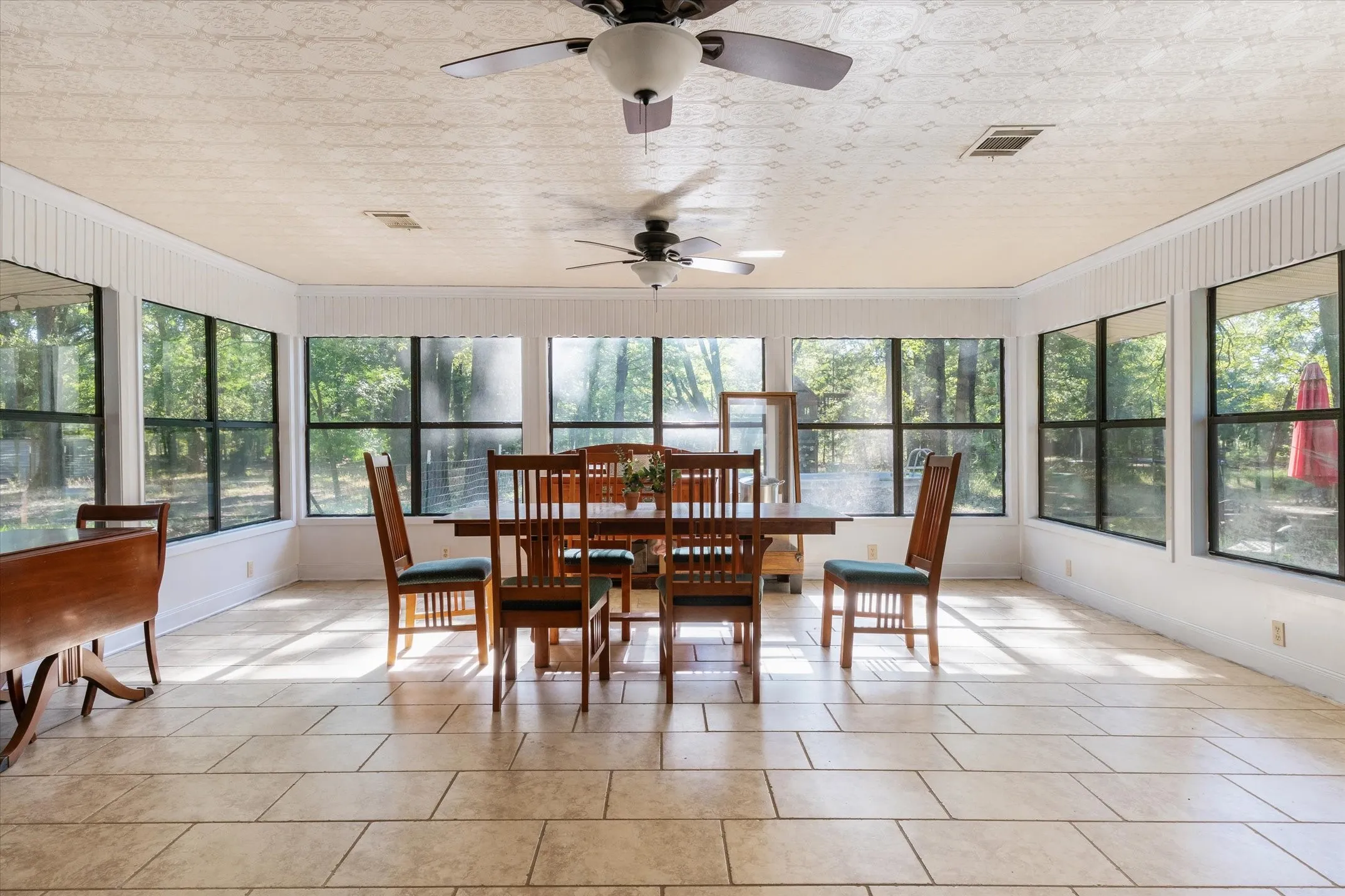 Sun room - Fun Room.  Just off the living room has all the potential.