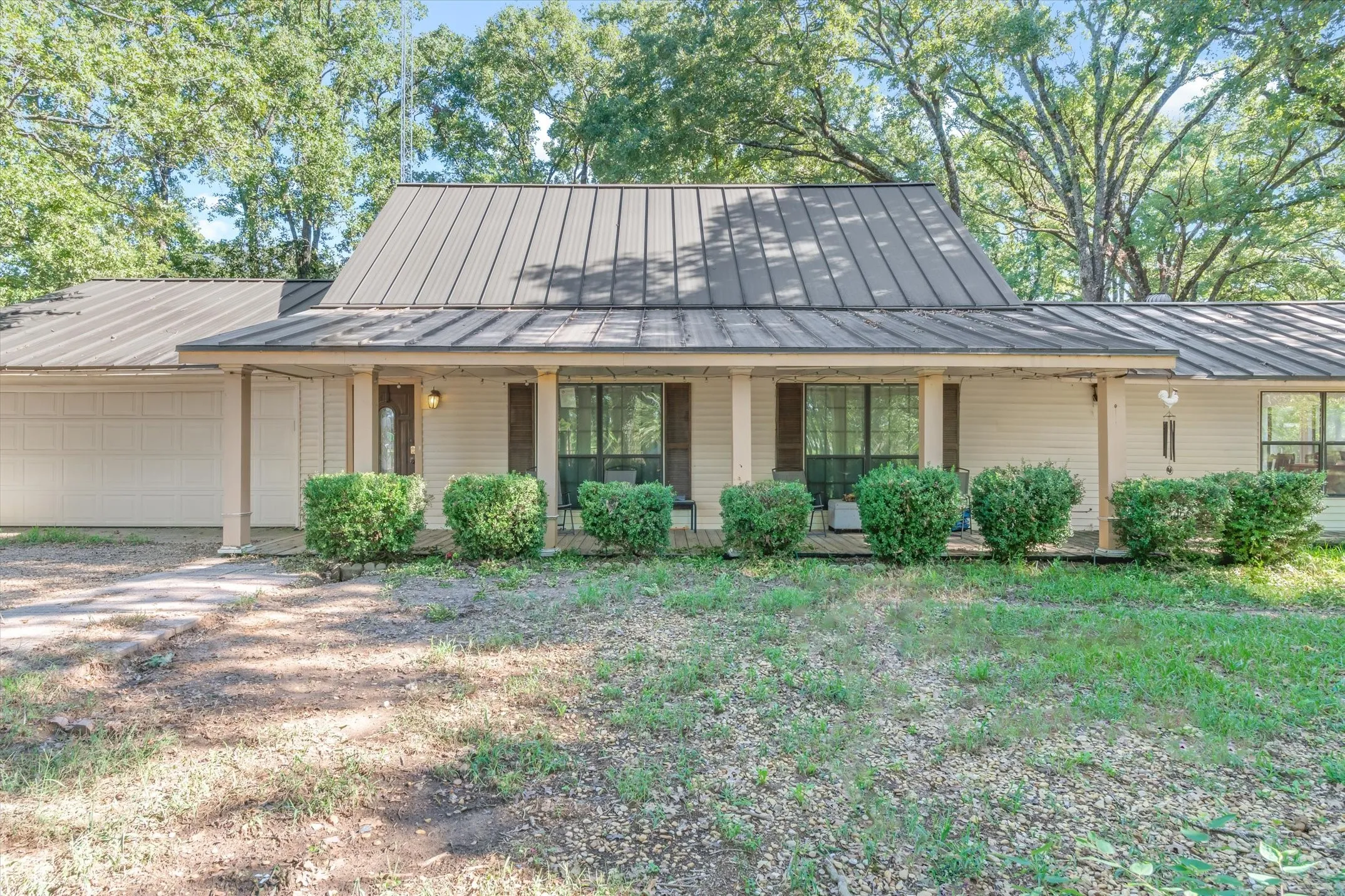 10 yrs old metal roof covers the large front porch.
