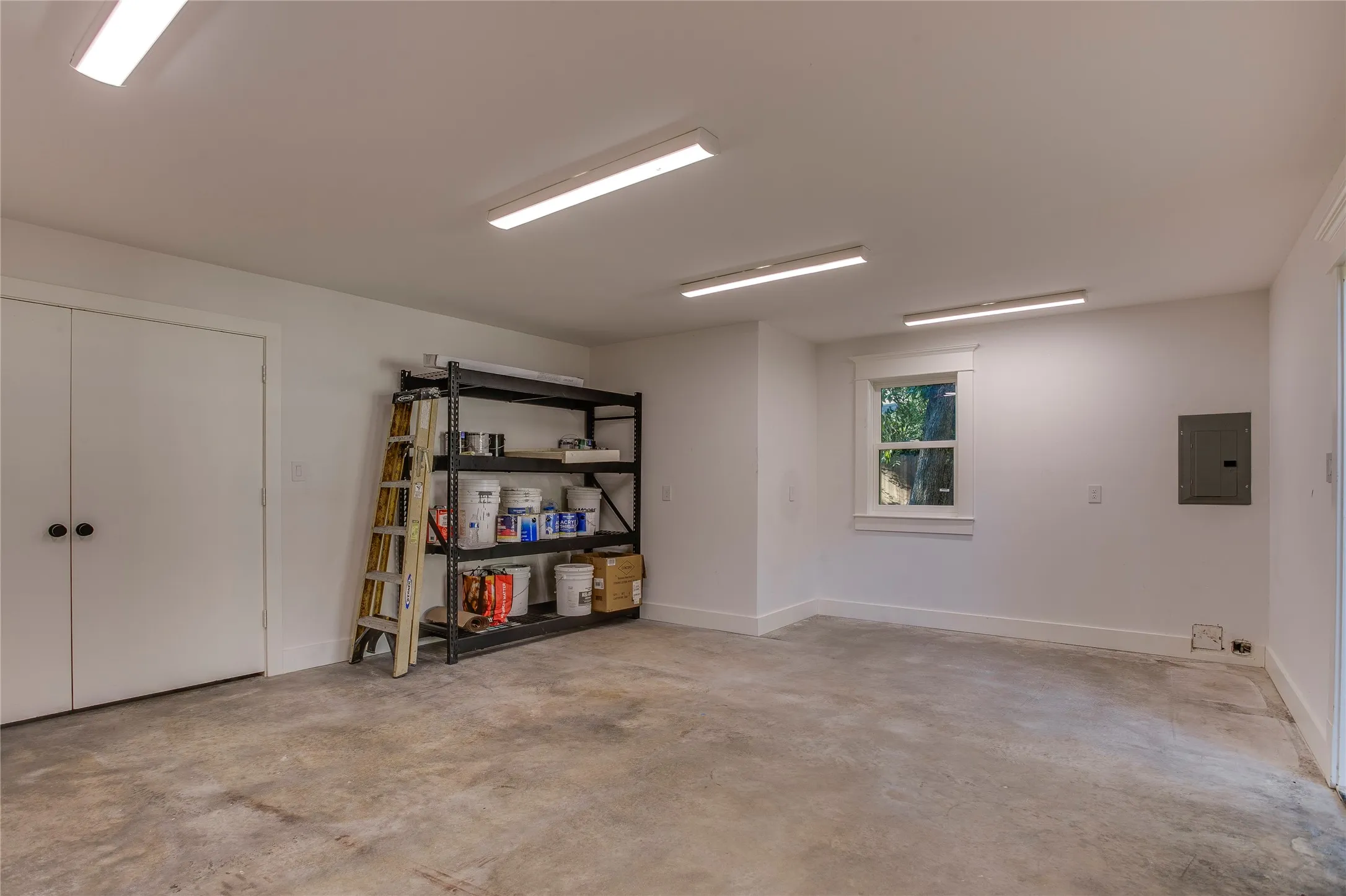 Lower level of the detached two-story accessory building. this space is conditioned for comfort year round.