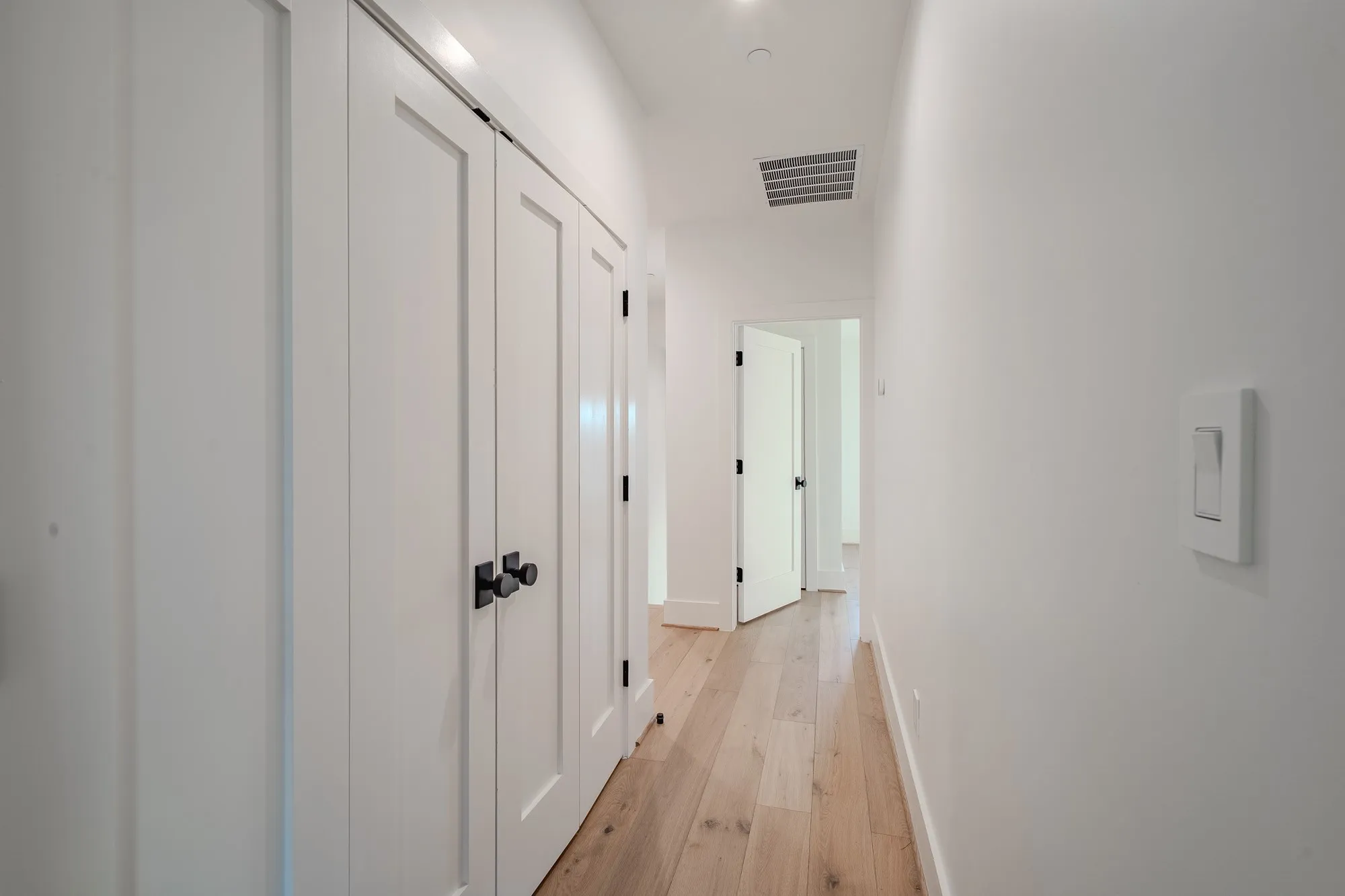 Laundry room behind doors