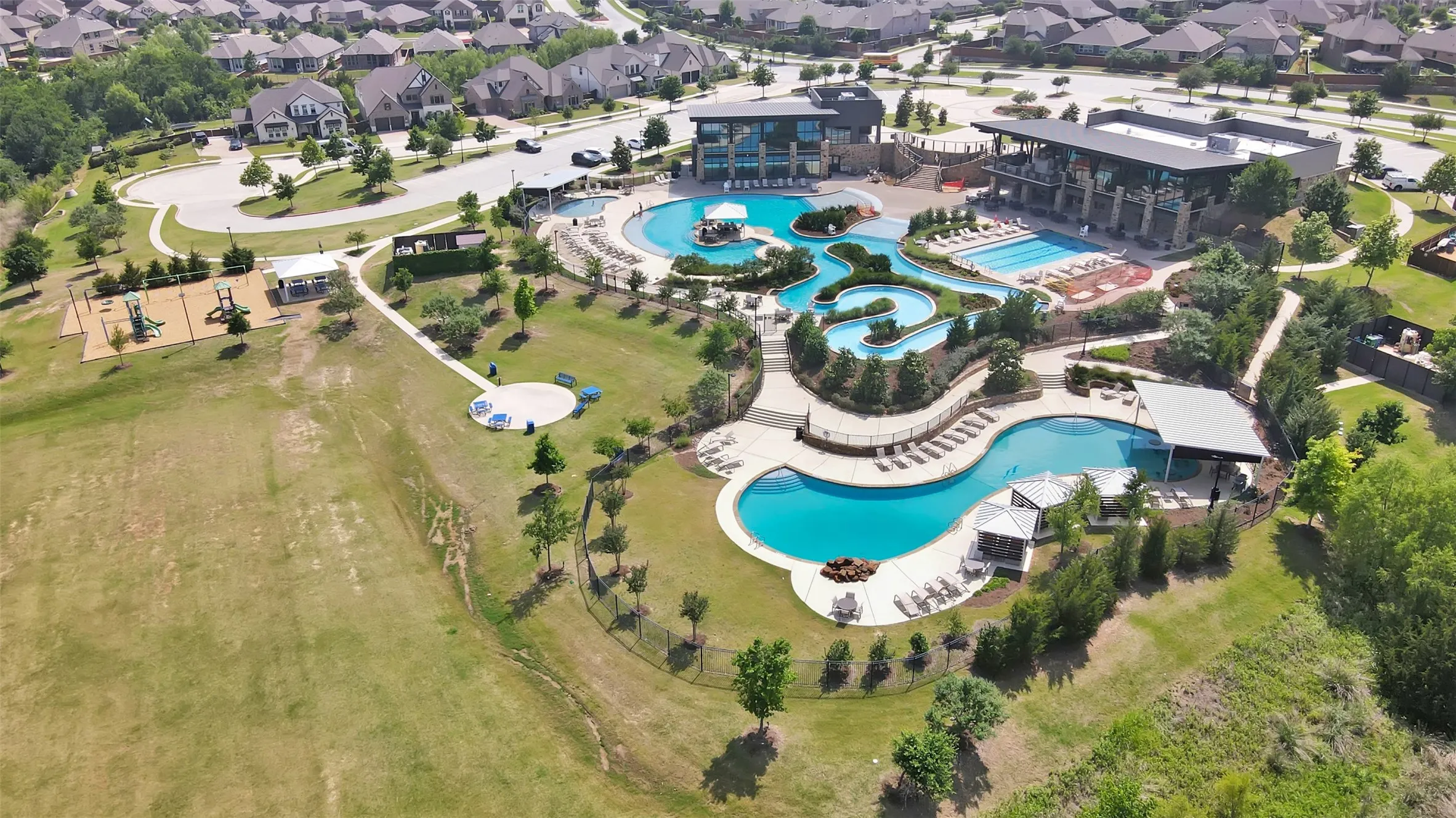 HOA offers year-round lazy river, pools, clubhouse, fitness center, disc golf, playgrounds, zip line, dog park, pickleball courts, sand volleyball, walking trails