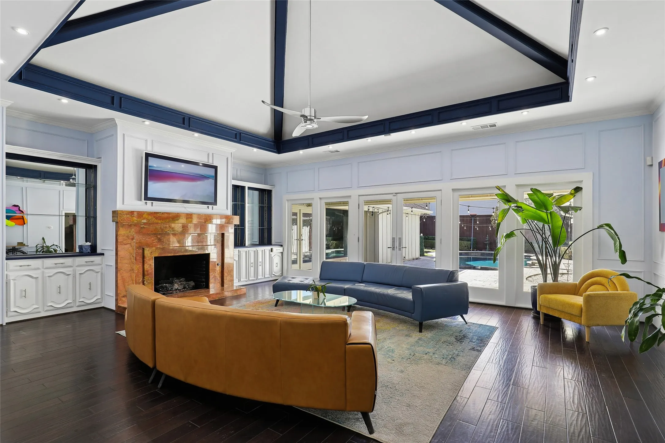 Located just past the grand entry, the living room provides a great place to entertain guest, or just sit back and relax. A wall of window provides great view of the patio and pool and offers abundant natural light.