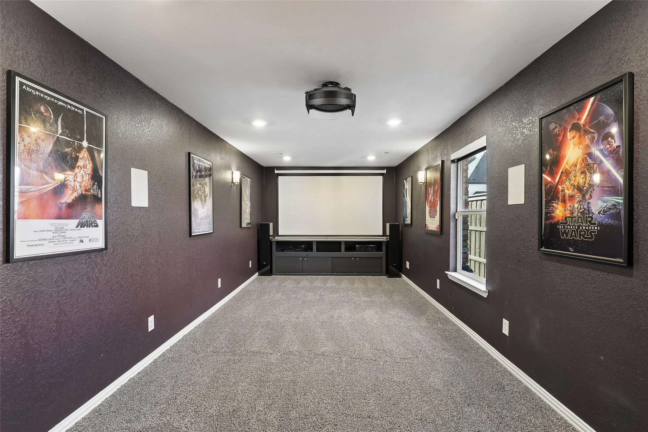 Separated Media room and adjacent family room could easily be converted to in law suite with full bath