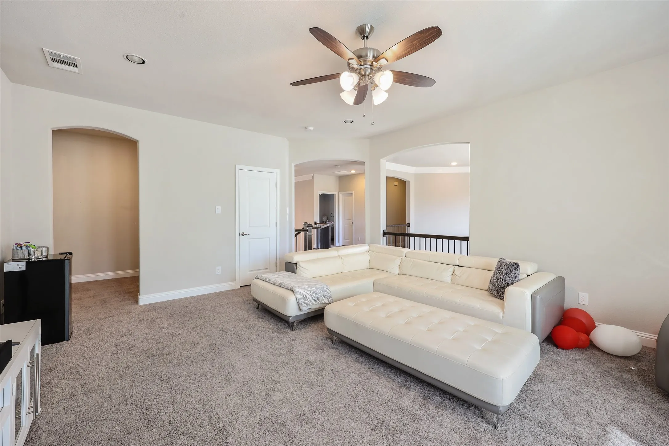 Upstairs living or game room with side cubby play area