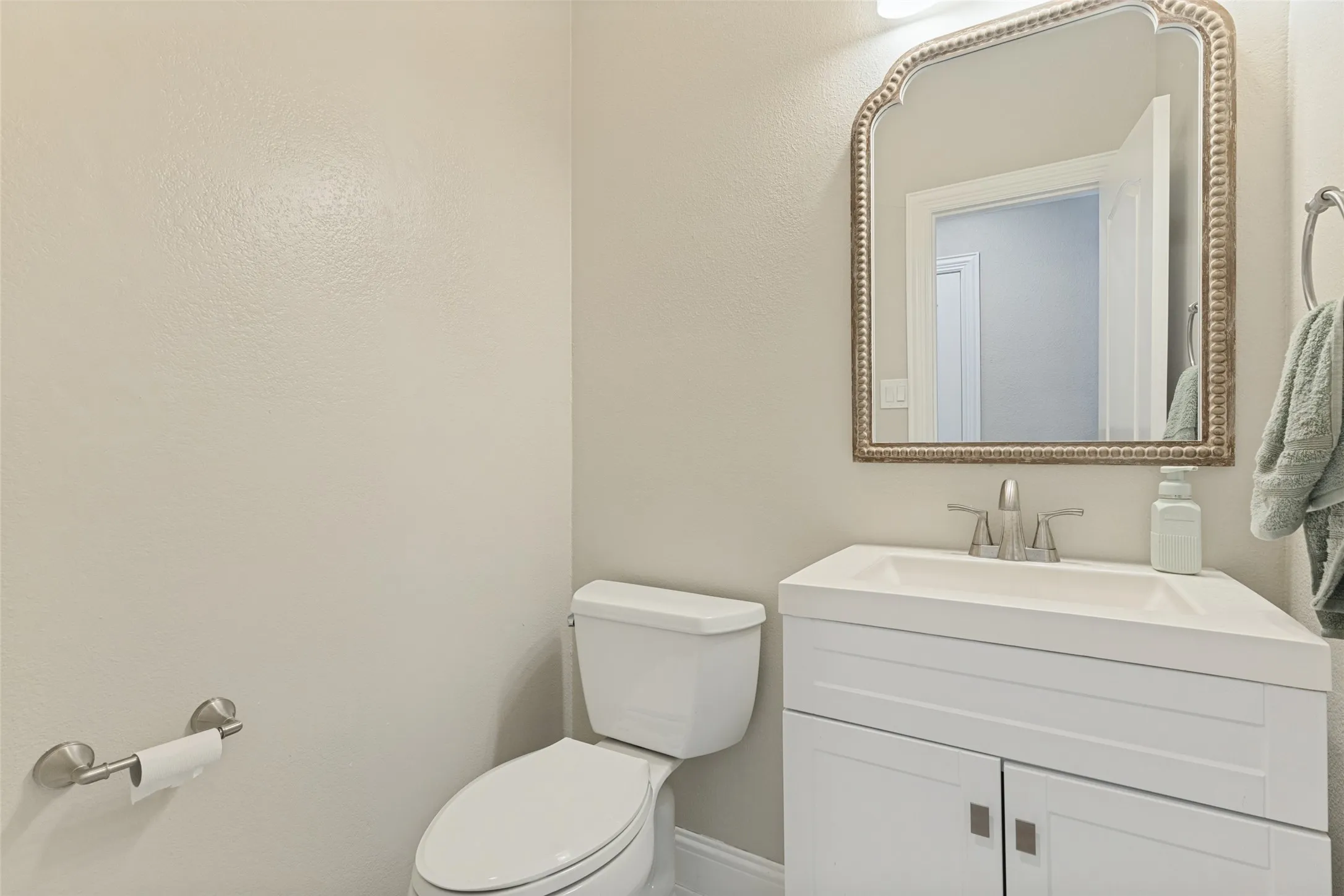 Conveniently located half bath downstairs