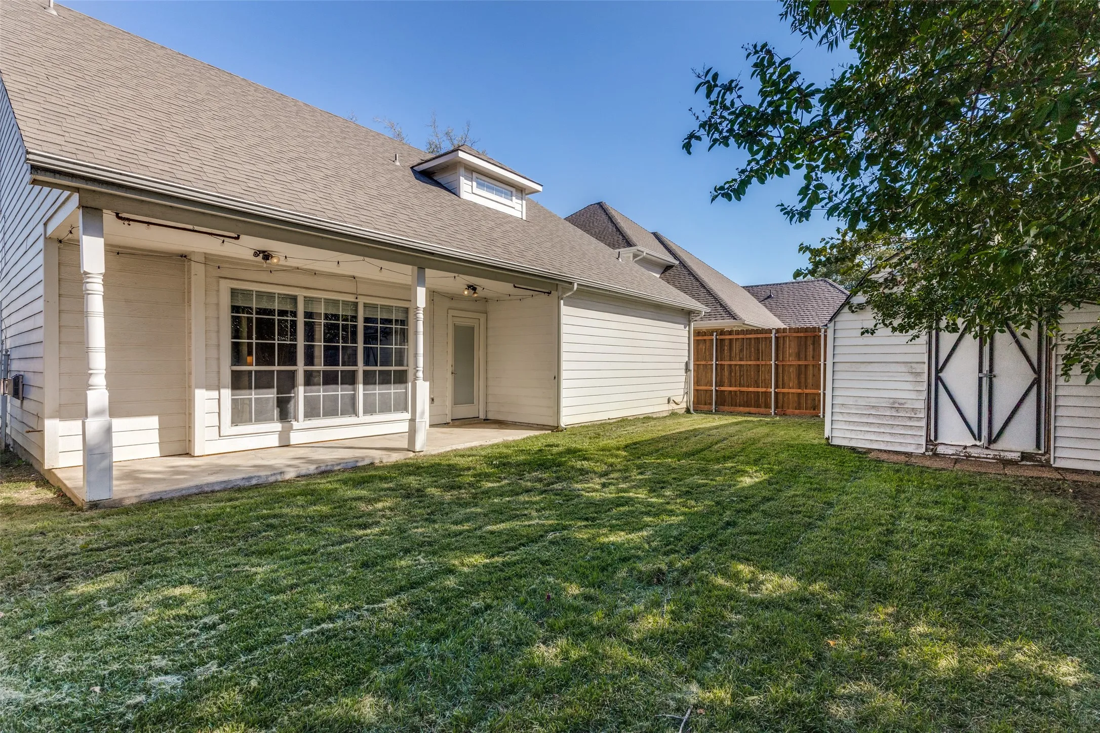 Completely fenced in backyard perfect for families and their pets