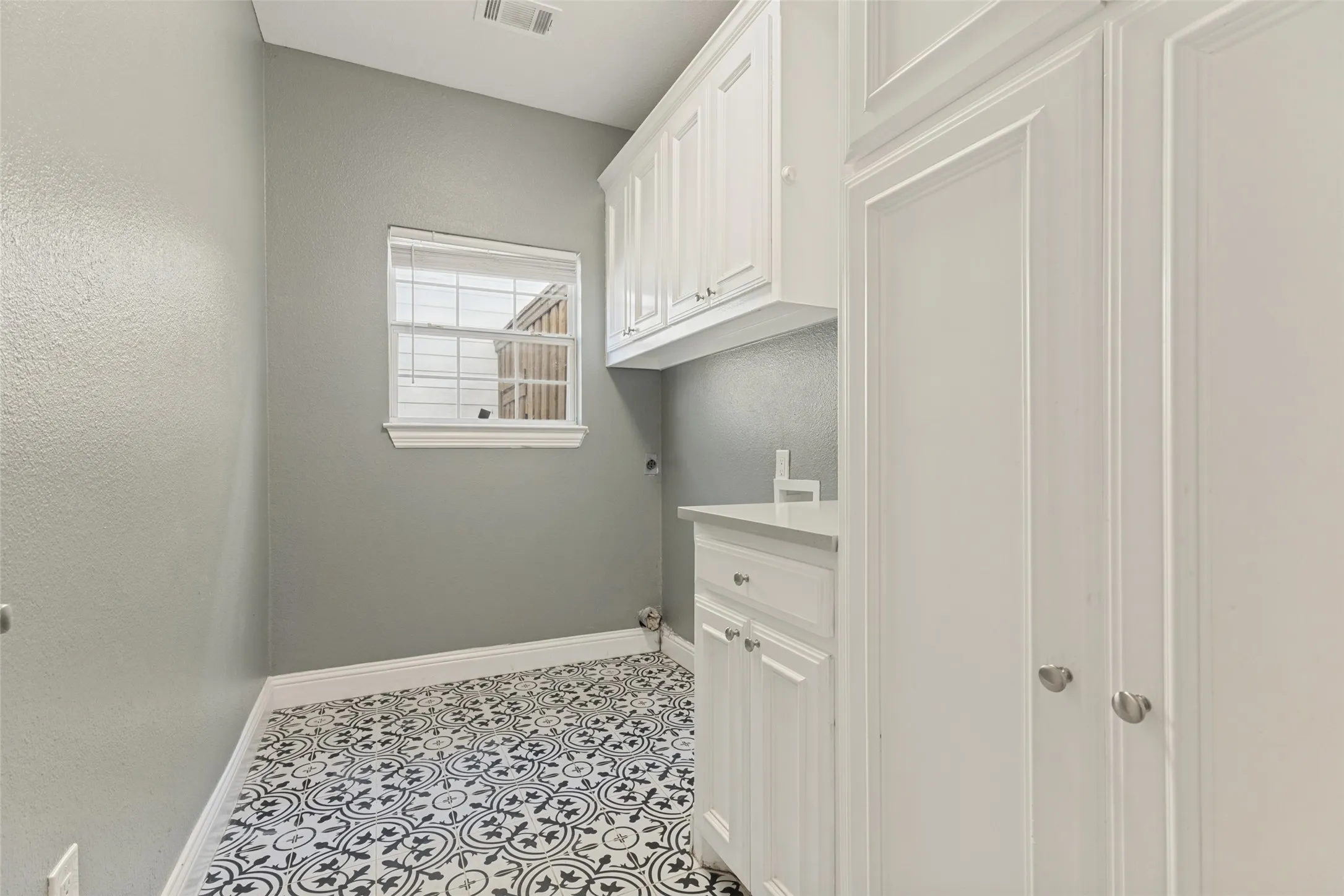 Laundry room with built-ins great for mudroom use too