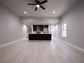Open concept living room and kitchen.