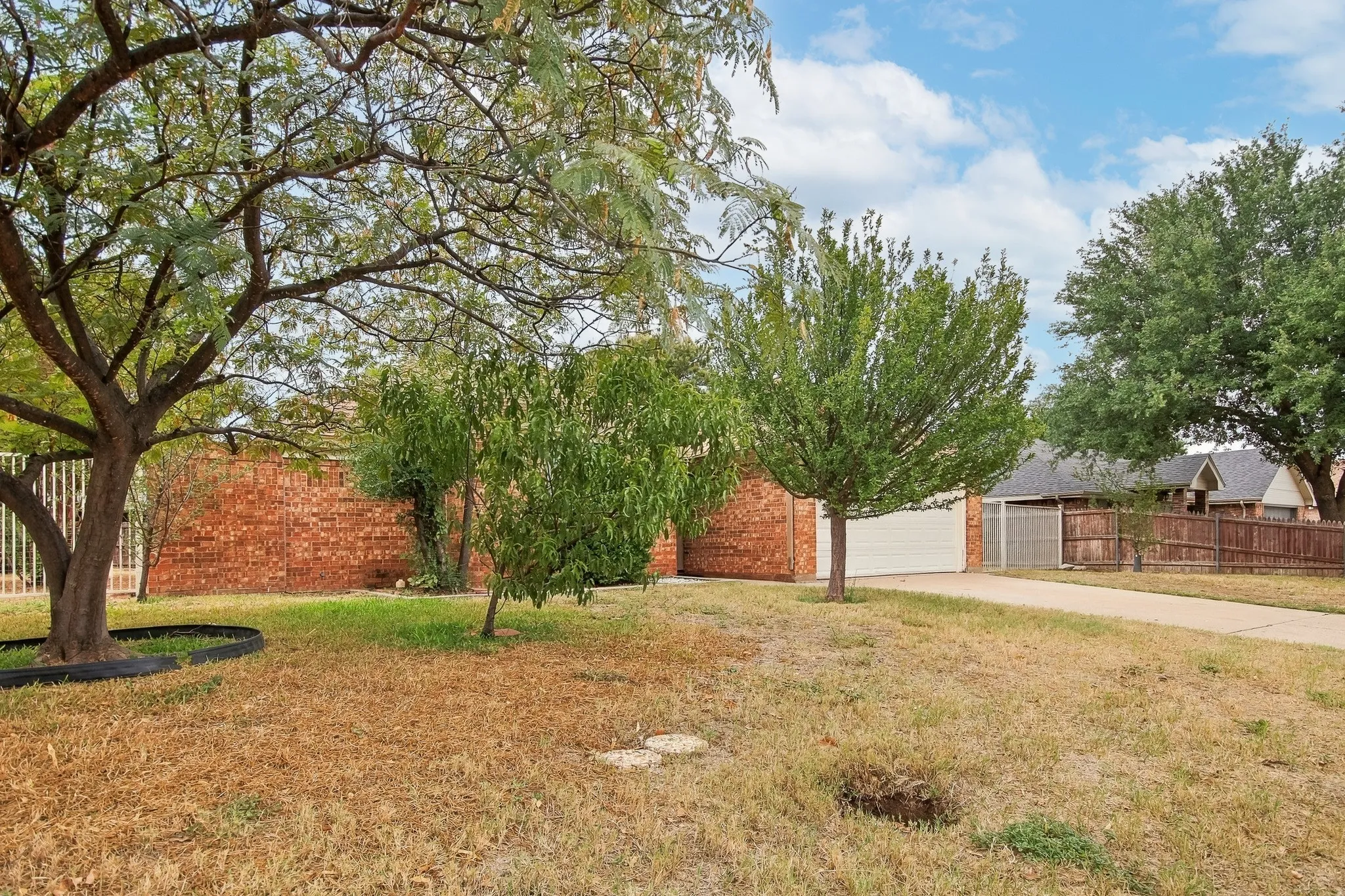 Brick exterior construction with an attached garage