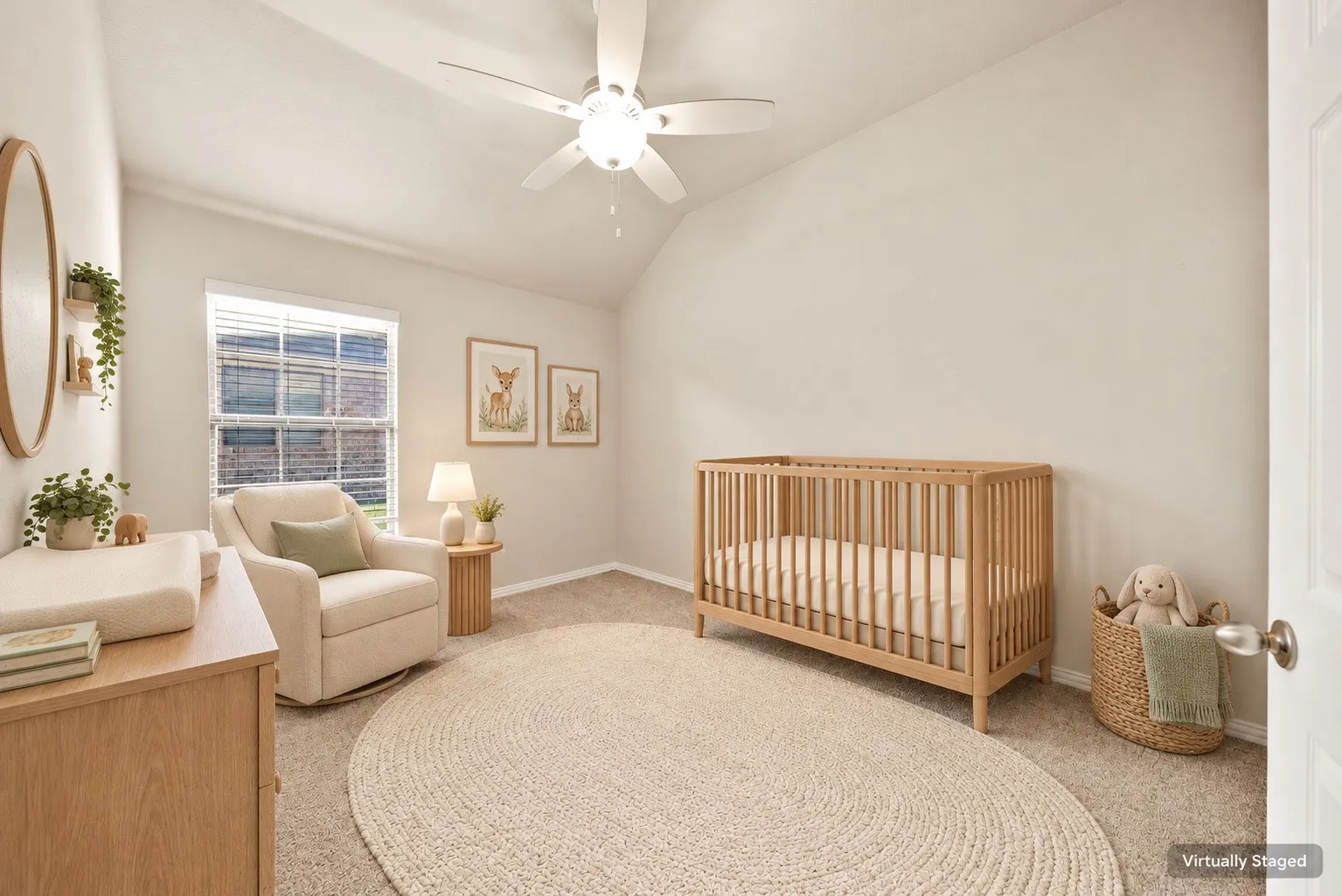 Vaulted ceiling featuring a ceiling fan