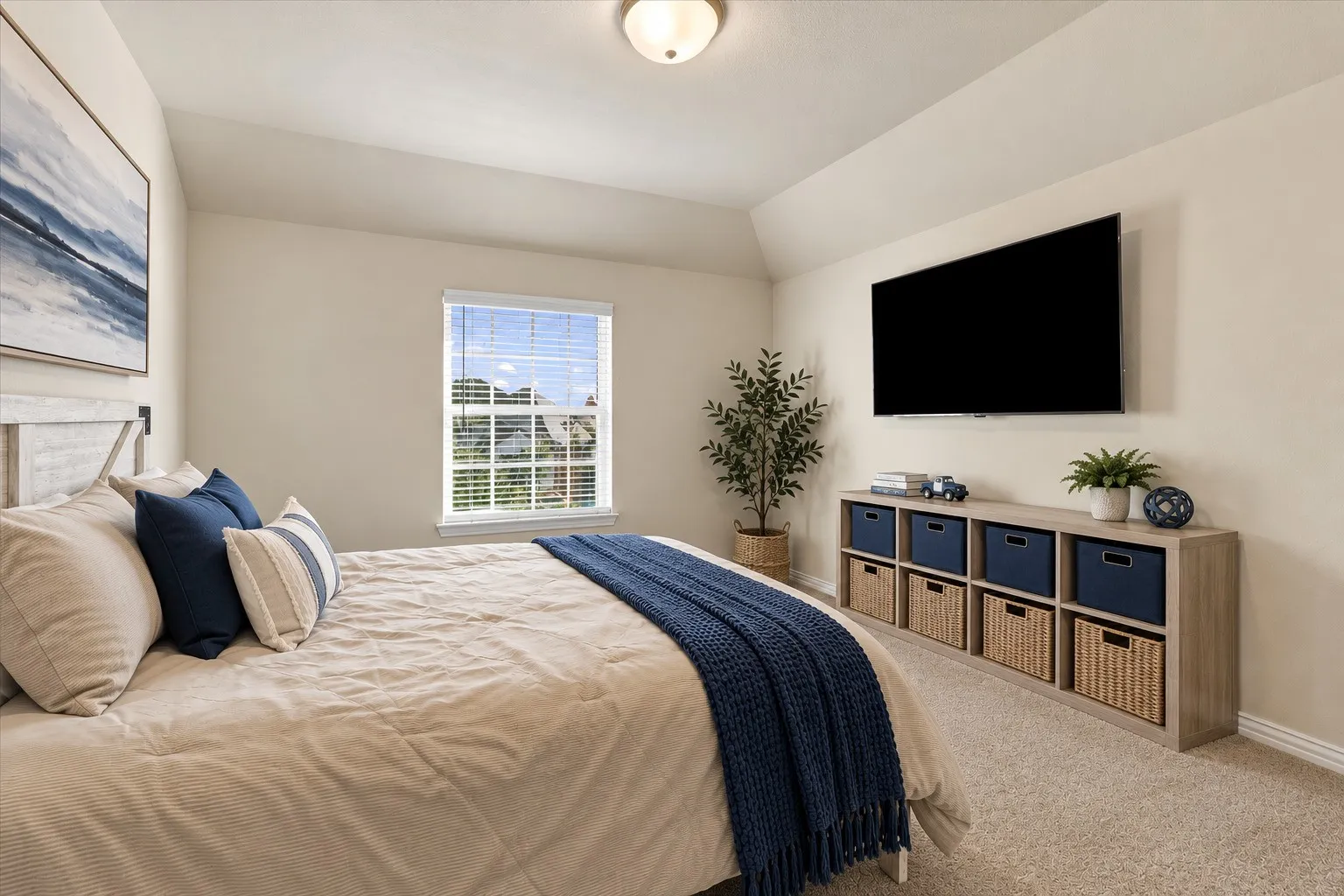 Angled ceiling featuring a built-in light fixture, a window with horizontal blinds, and wall-to-wall carpeting
