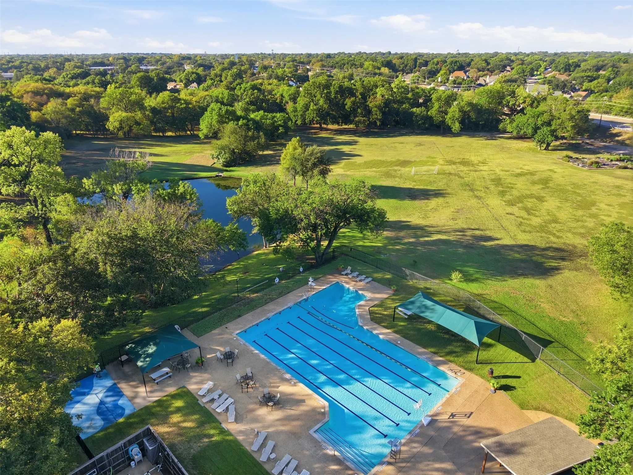 Resort-style swimming pool, and expansive green spaces