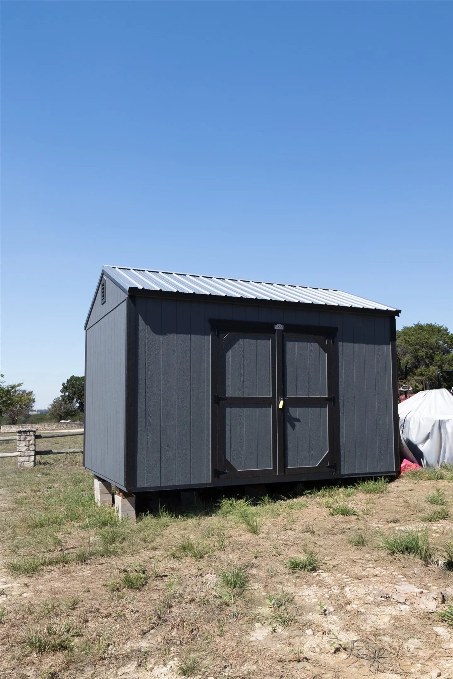 Storage Building stays with the house.