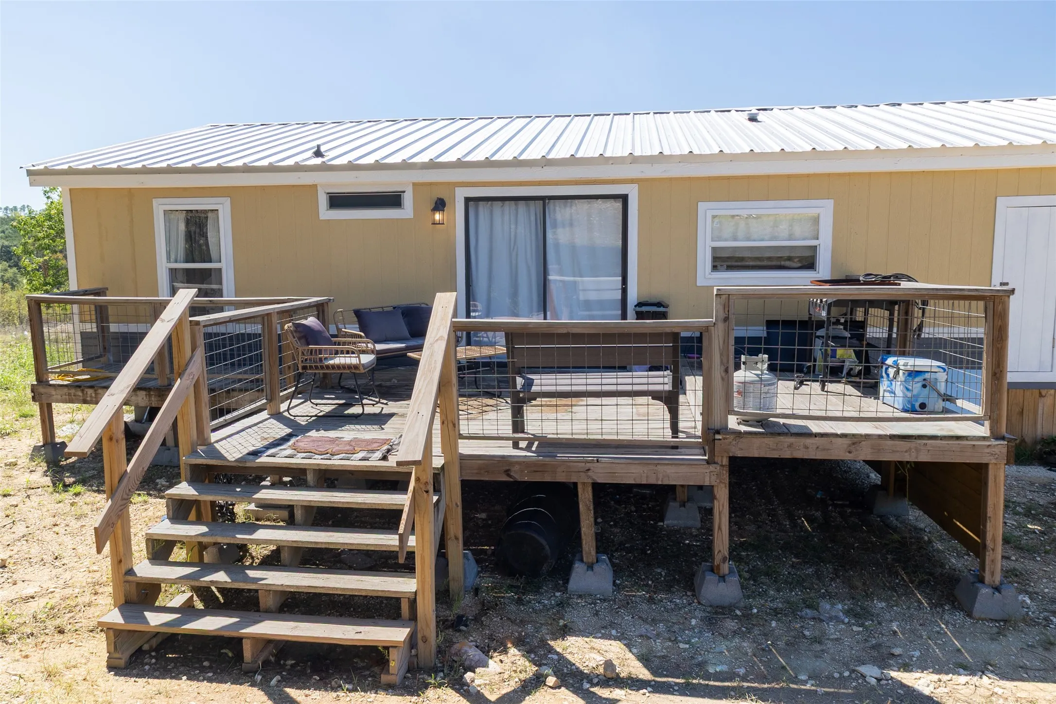 Great deck for relaxing and entertaining off back door!