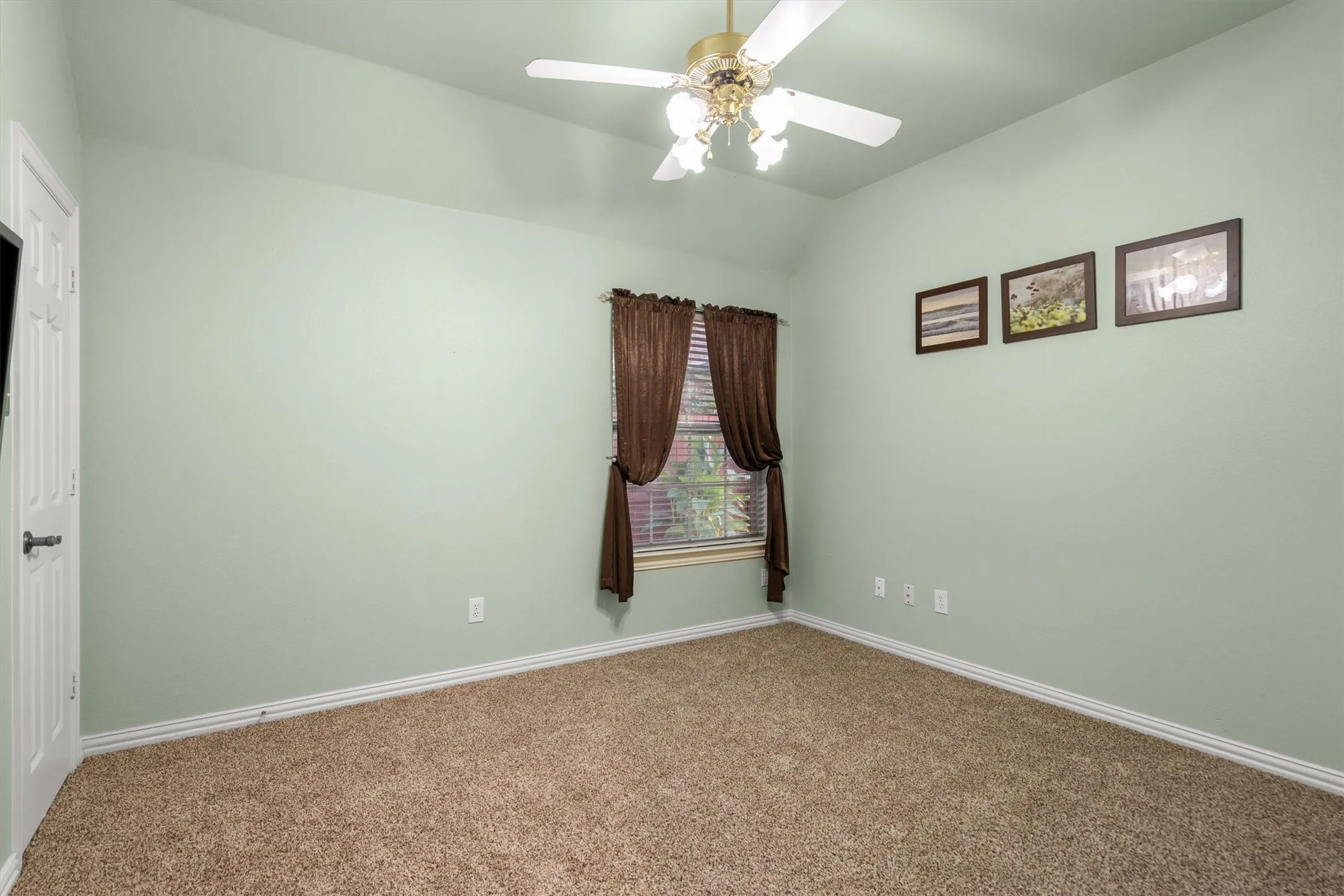 Bedroom with walk in closet and new carpet