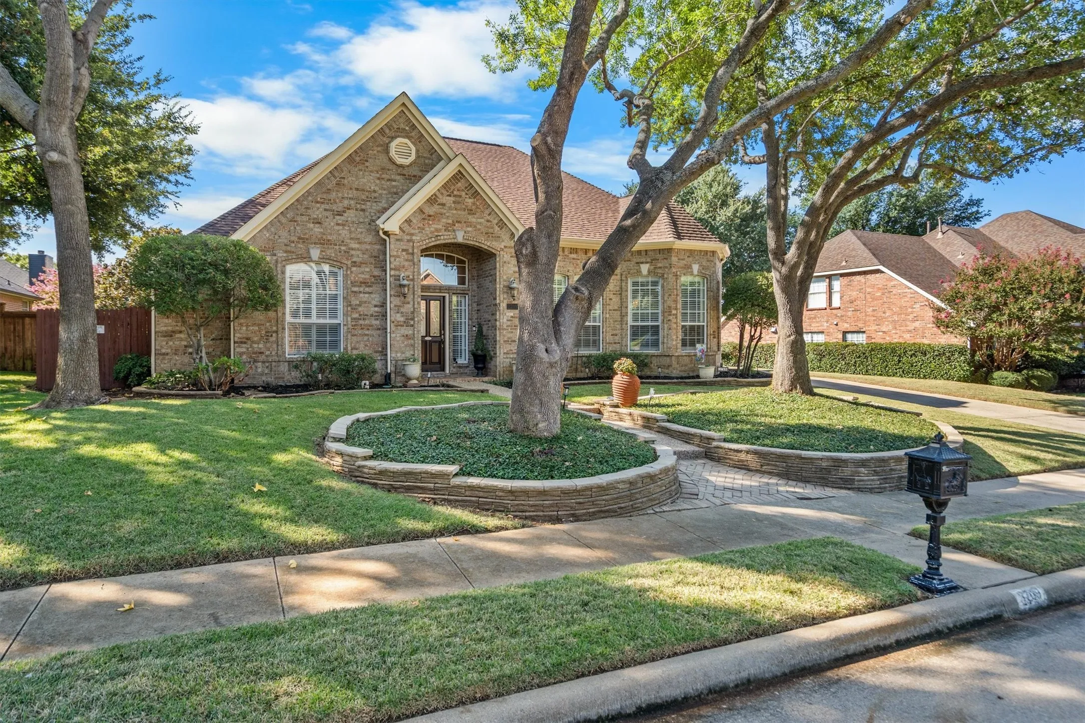 Professionally landscaped front yard for great drive up appeal