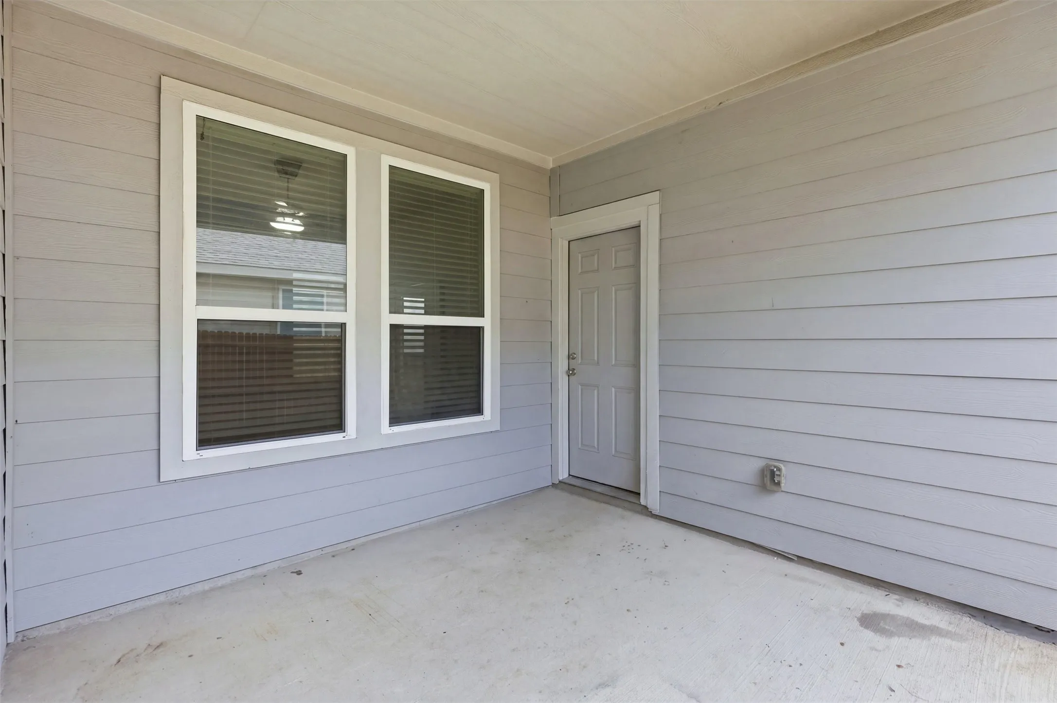 Patio door that leads to garage