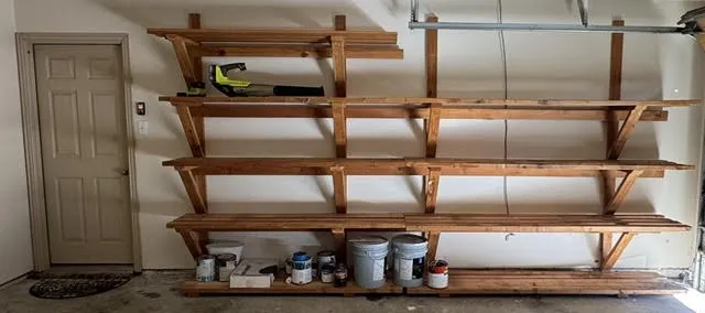 Incredible Shelving in the garage lining both sides.  Exceptionally constructed.