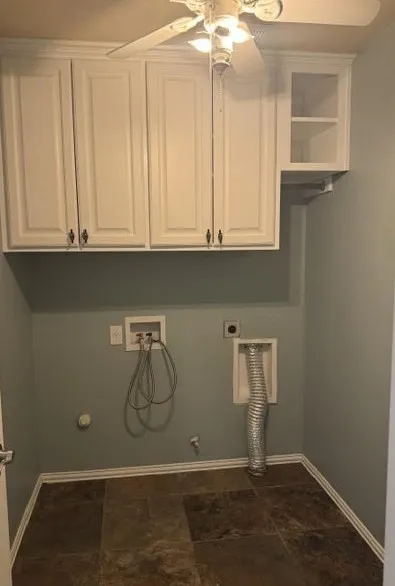 Just off the main hallway and pass through to the Garage