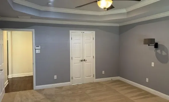 Off the kitchen and den with primary bathroom

