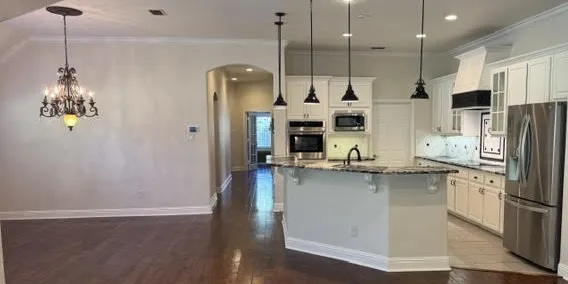 Just off the kitchen and adjacent to the main living area
