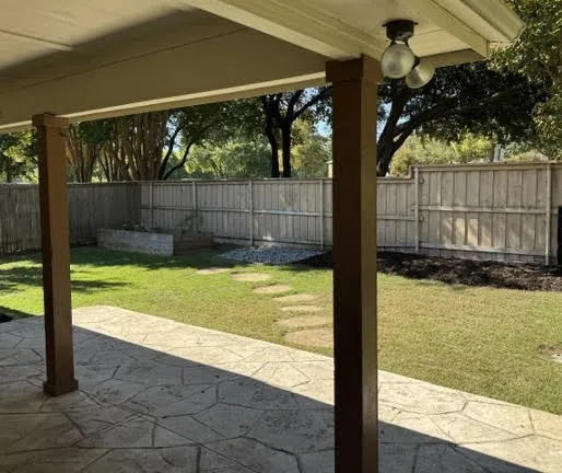 Patio off the main living area opens to the friendly back yard, gardening is an enjoyable activity

