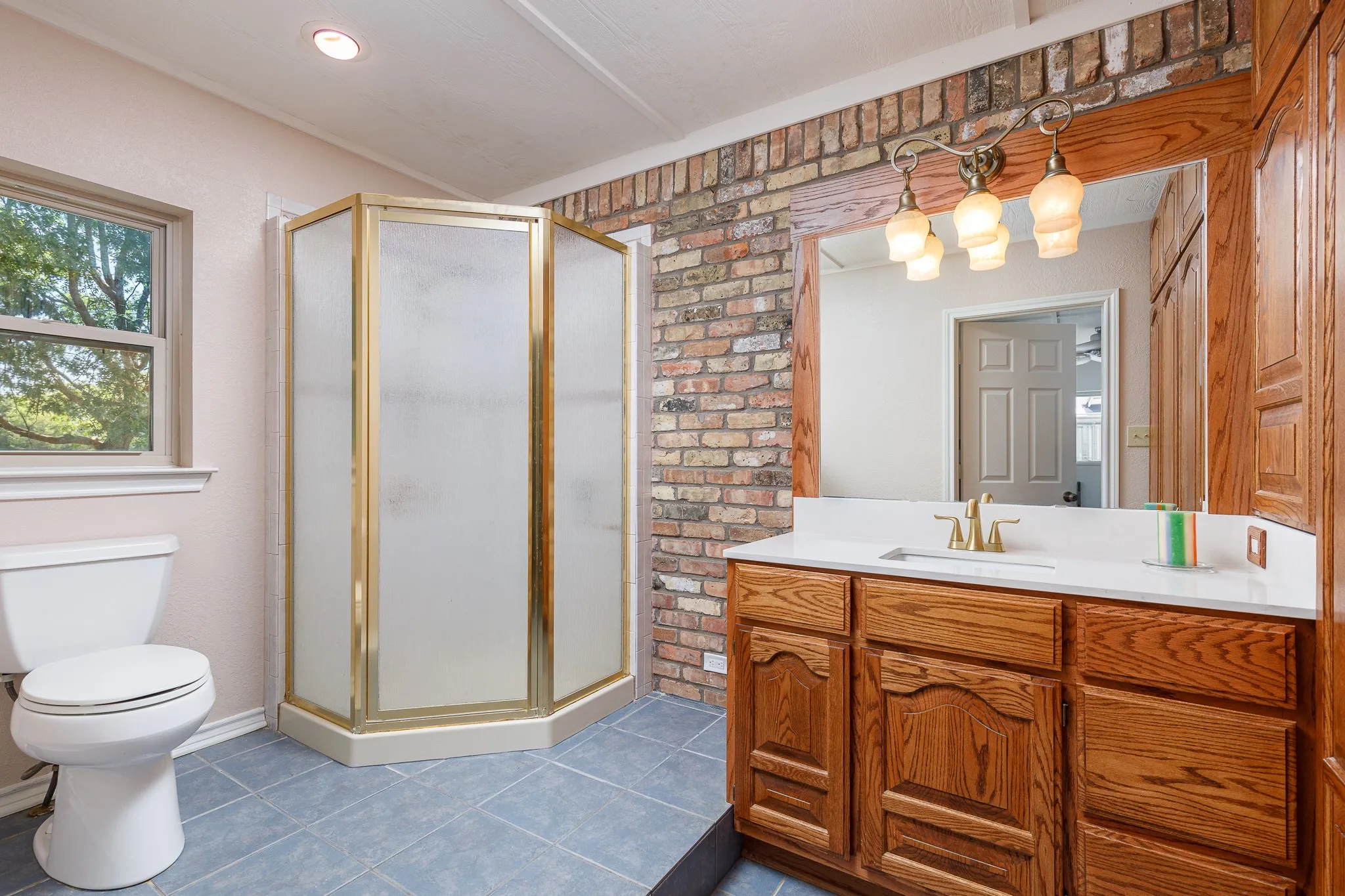 Bathroom off from Family Room with Wall of storage