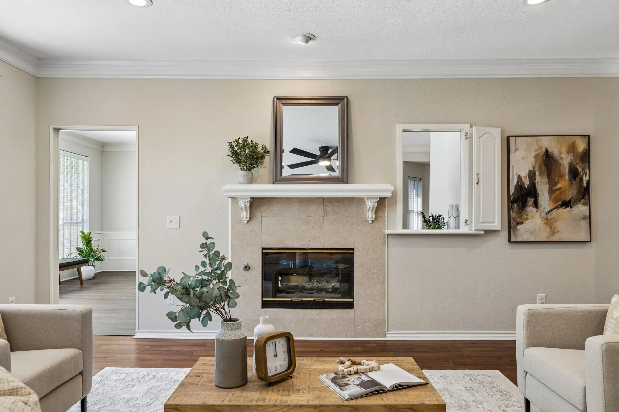 Double-sided fireplace between the two living areas on Level 1
