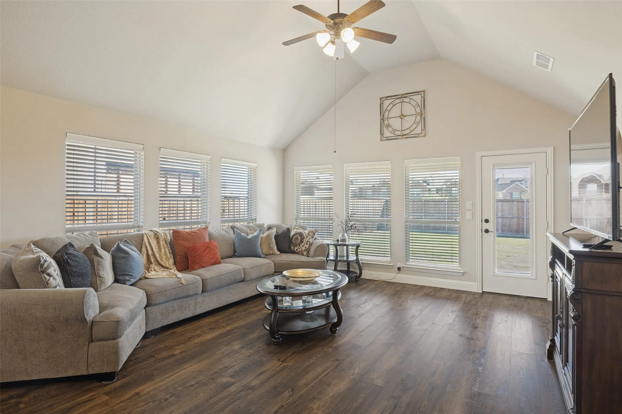 View of sizeable living area with plenty of windows for an abundance of natural light.