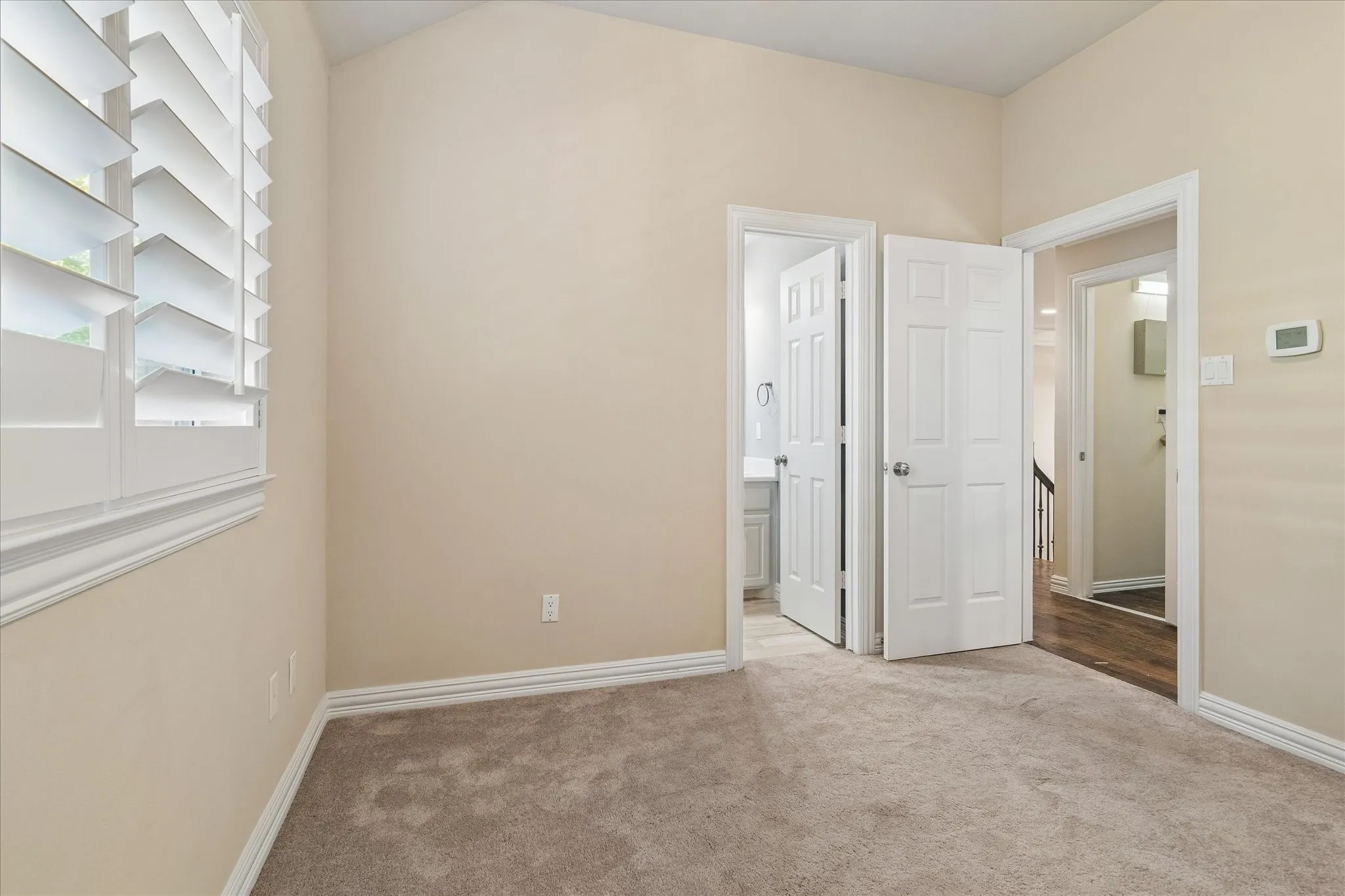 Upstairs bedroom with ensuite bathroom.