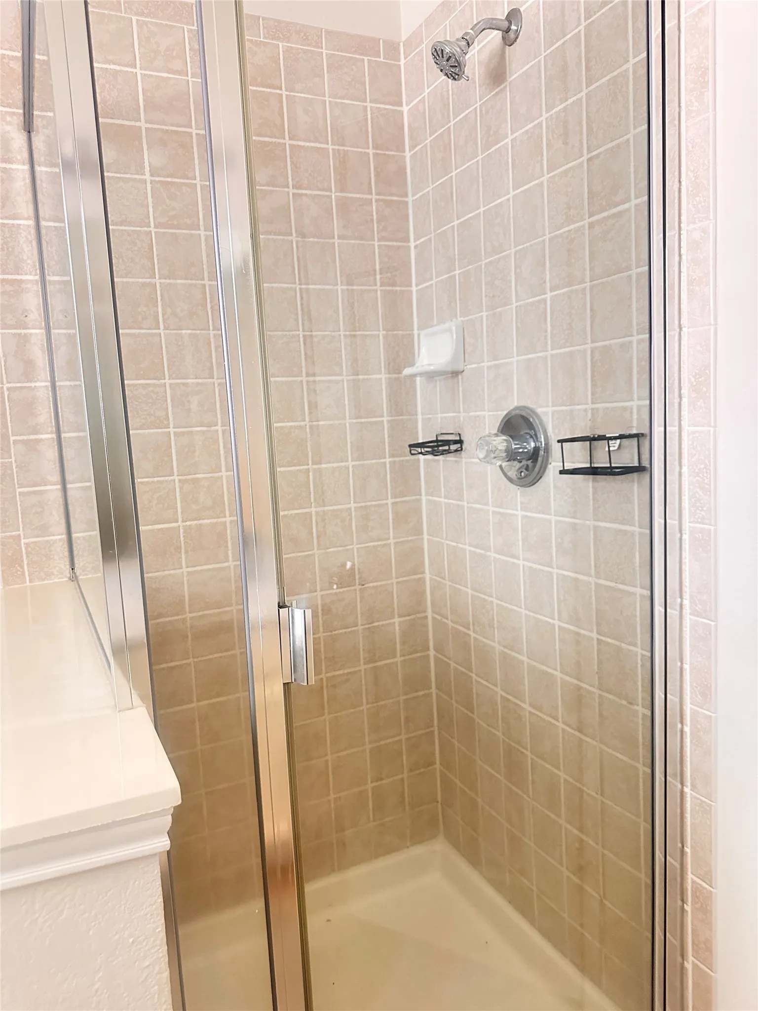 Bathroom with a stall shower