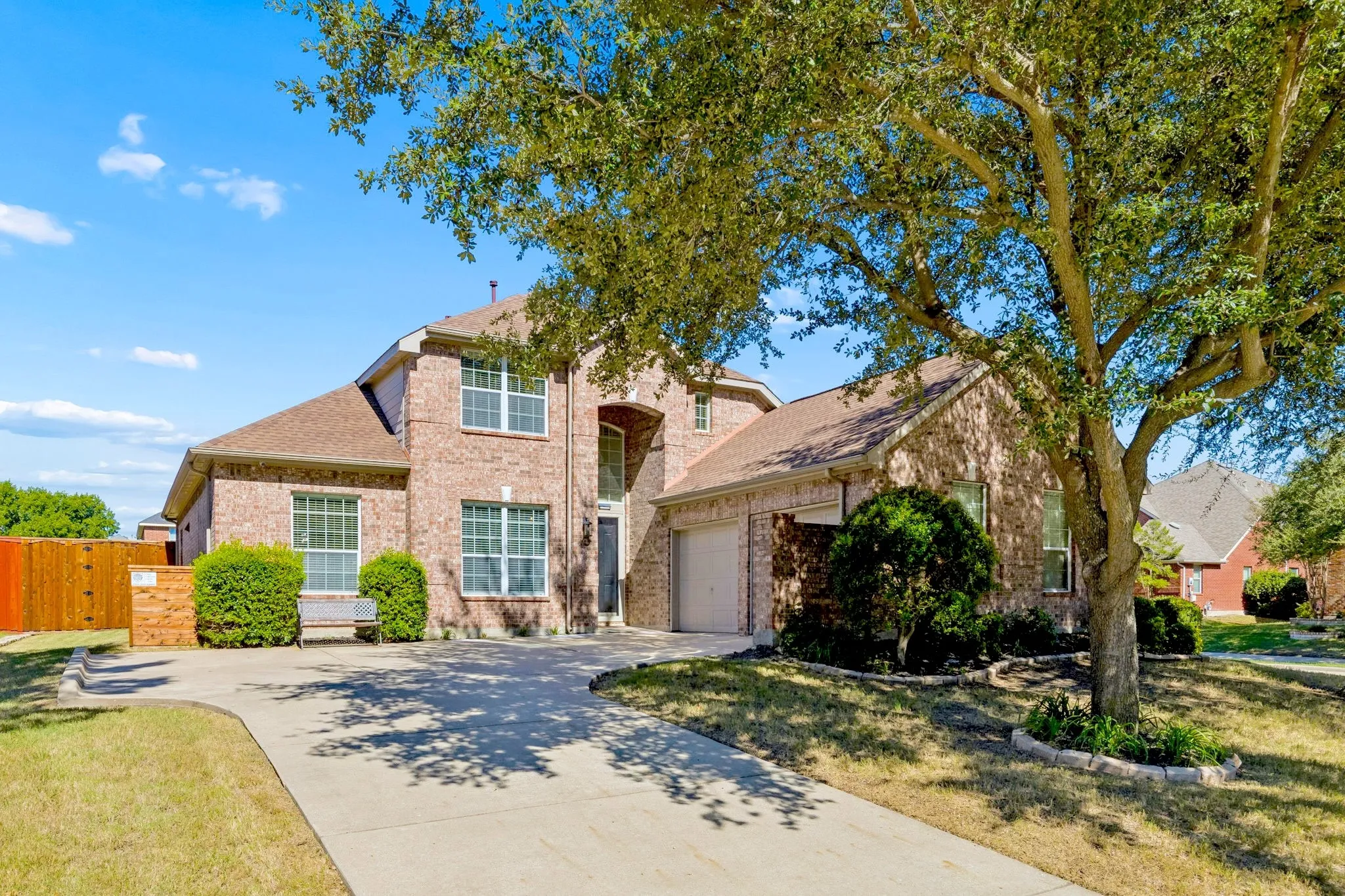 Welcome to Waterview! – Beautiful two-story brick home situated on an interior corner lot along a quiet cul-de-sac, featuring mature shade trees, attractive landscaping, and a spacious driveway with a two-car garage.