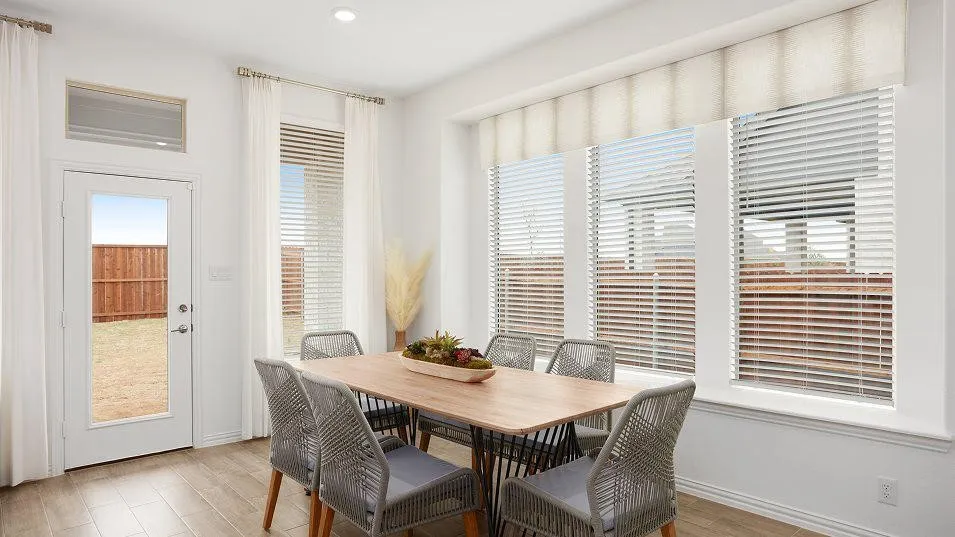 White walls with wood-finish flooring