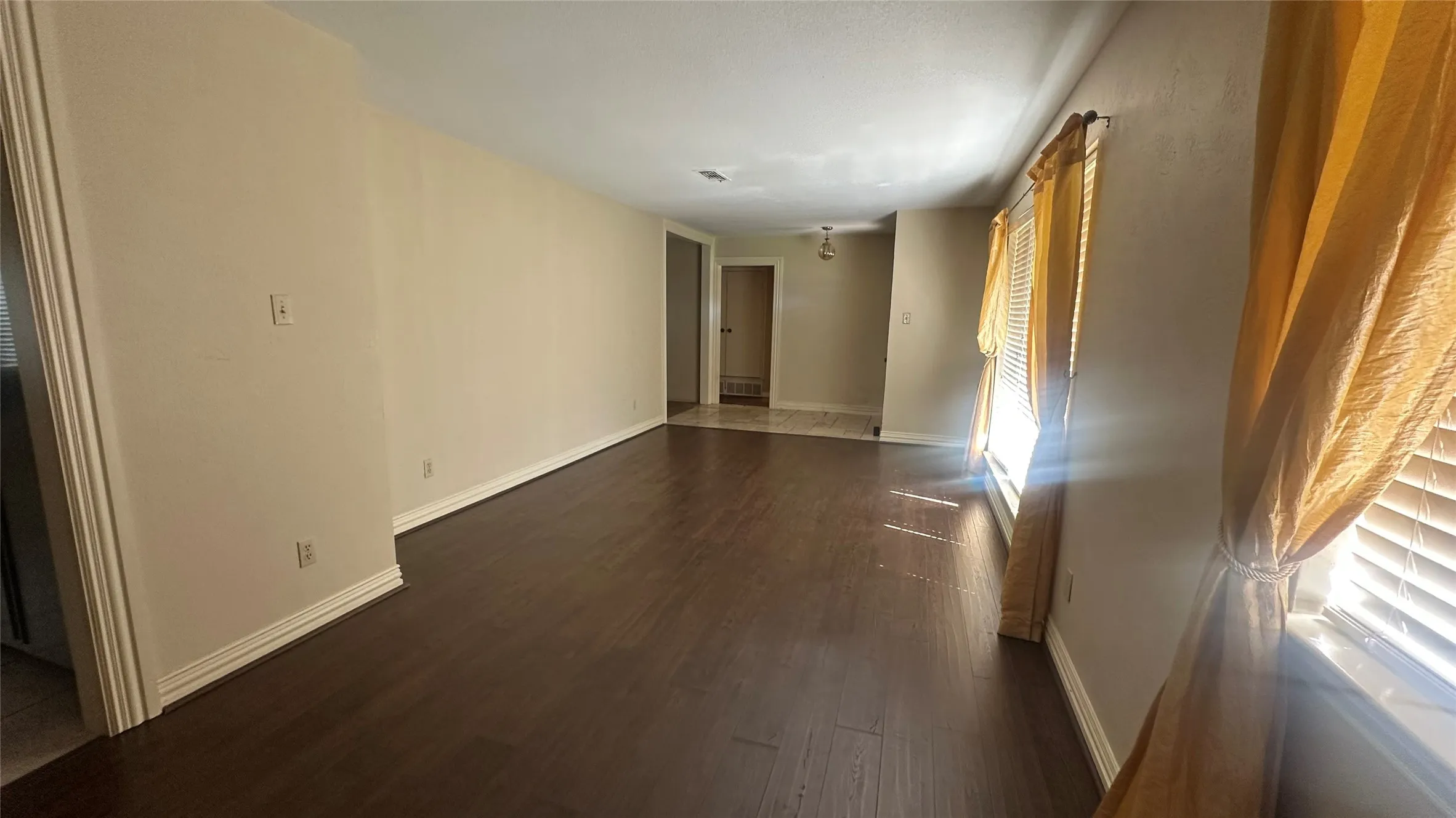 Unfurnished - Formal dining space and entrance from kitchen as well for serving,