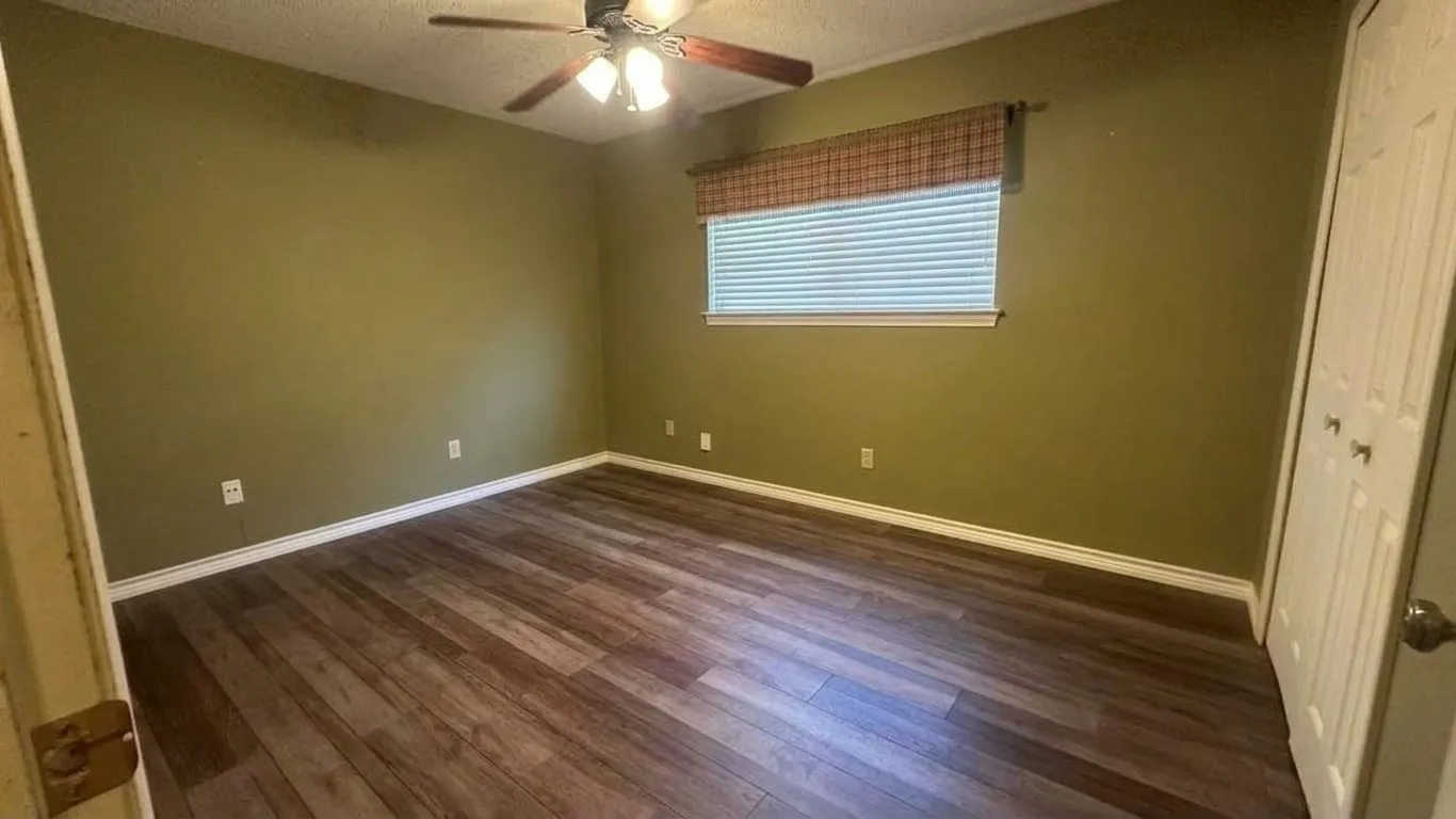 Same BR - unfurnished,  Middle bedroom with bathroom in hall, wood flooring in BR & full hallway, CF, double door closet.