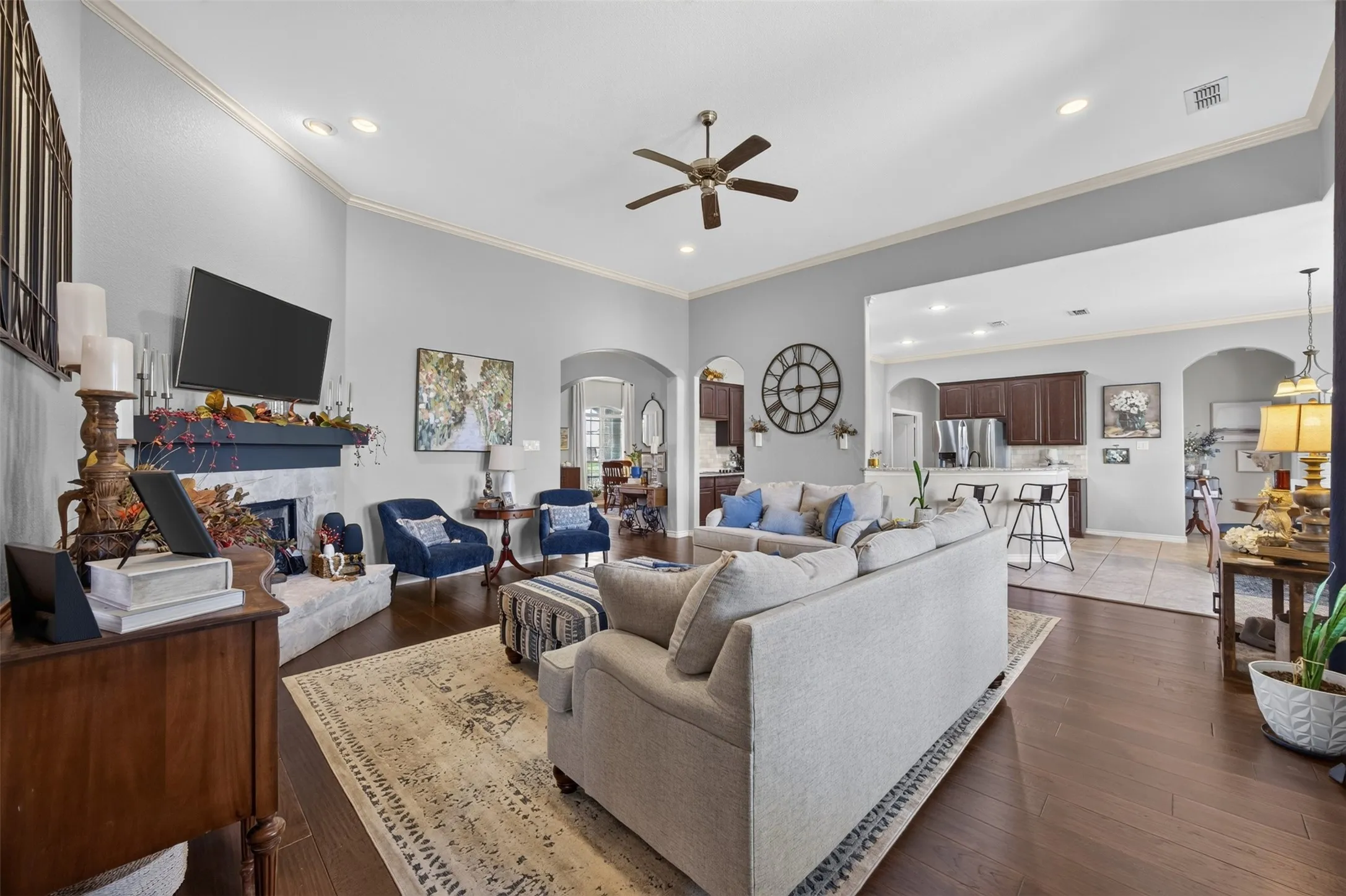 20x20 living room with stone wood-burning fireplace
